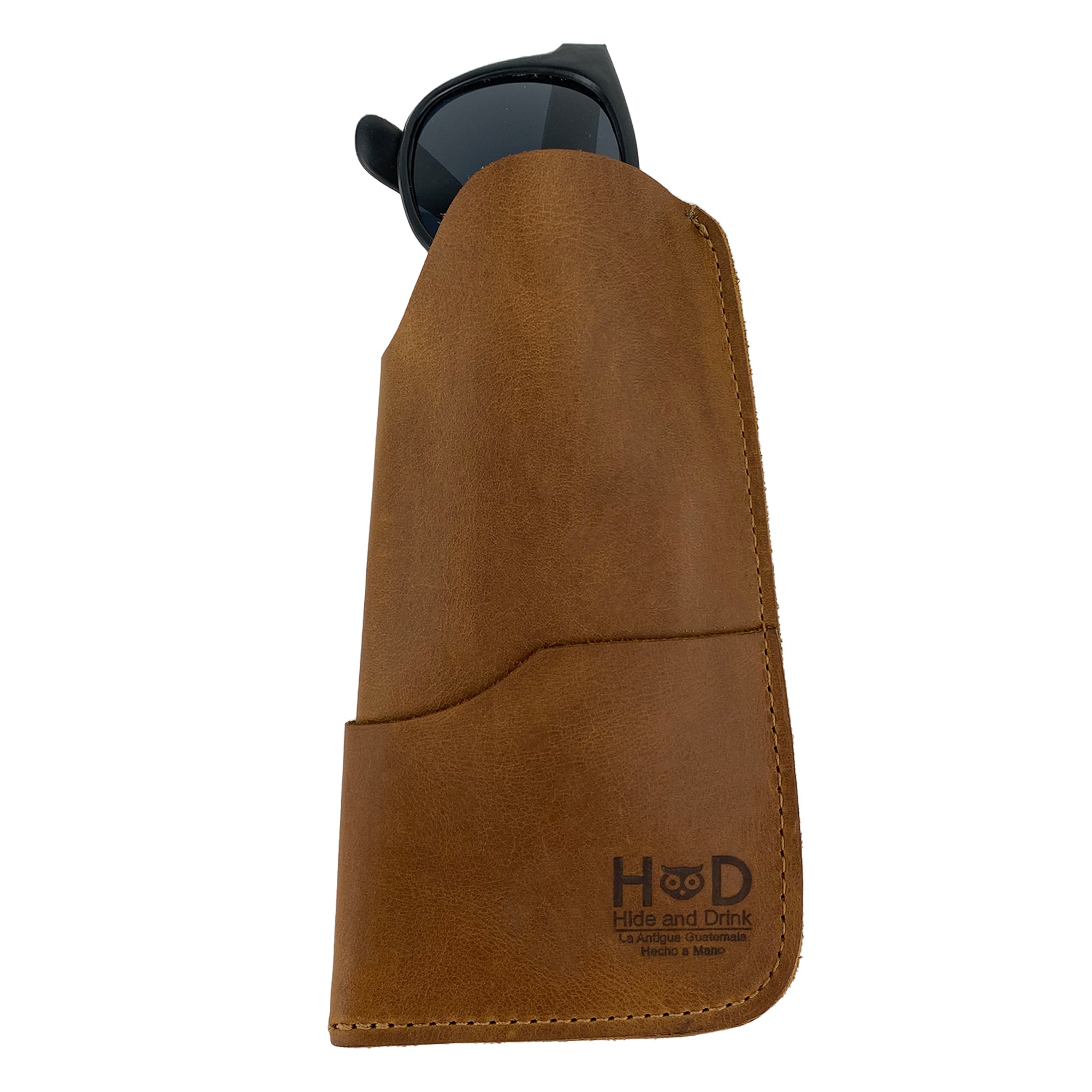 The Hide & Drink Sunglass Case & Wallet featuring a sophisticated dark brown design. This Rustic Sunglasses Case & Wallet is crafted from Full Grain Leather, perfect for keeping your glasses safe while traveling, artisanal quality from La Antigua Guatemala & Oaxaca Mexico.