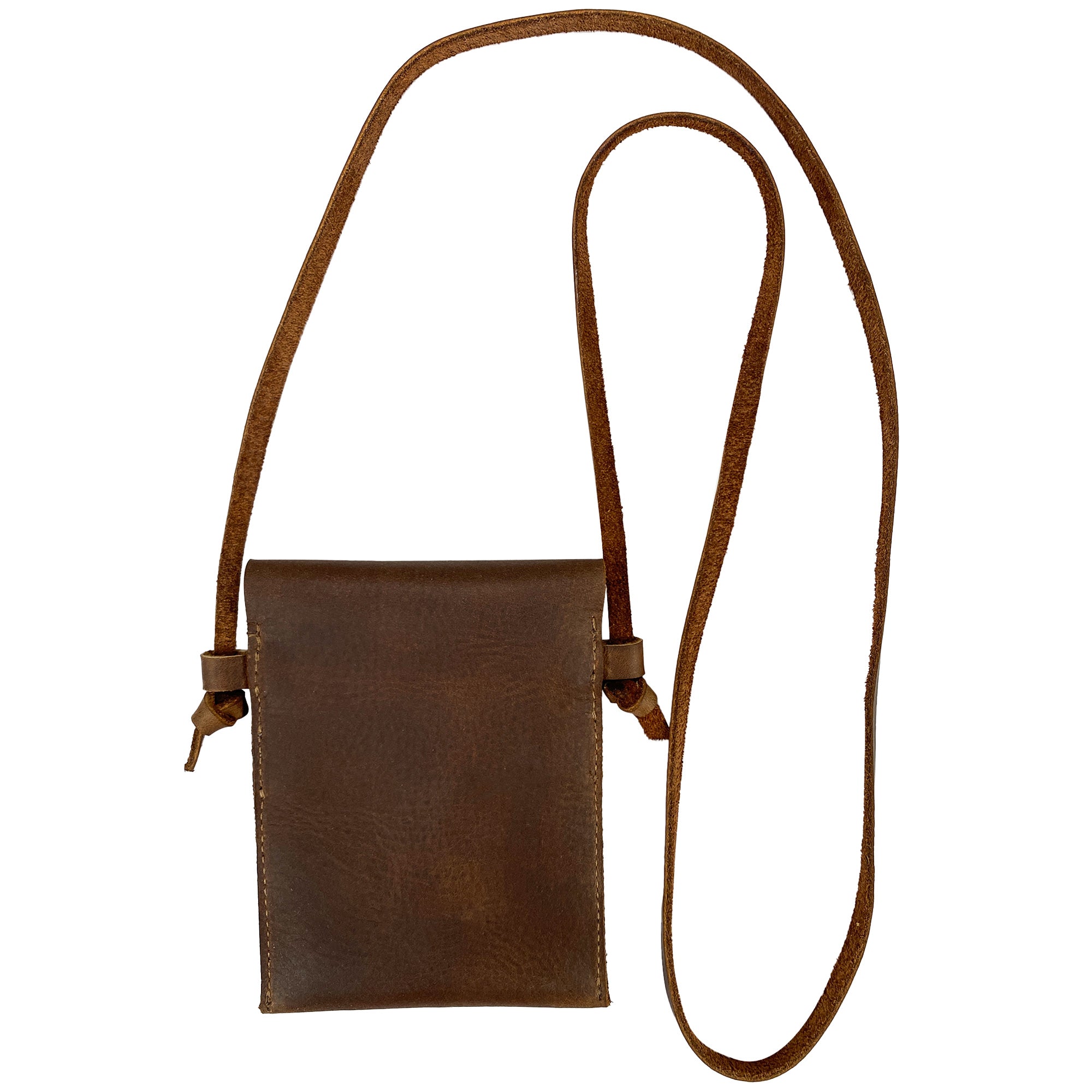 Back view of the Mini Travel Bag by Heather's showcasing its simple yet elegant brown leather finish. This Mini Travel Bag Handmade from Full Grain Leather serves as a classic organizer, coin pouch, and storage case for ID, credit cards, and cash. StockyardX, Small Batch Production, Hand Cut, Hand Sewn, Fire Branded, Artisan, Handmade in La Antigua Guatemala & Oaxaca Mexico.