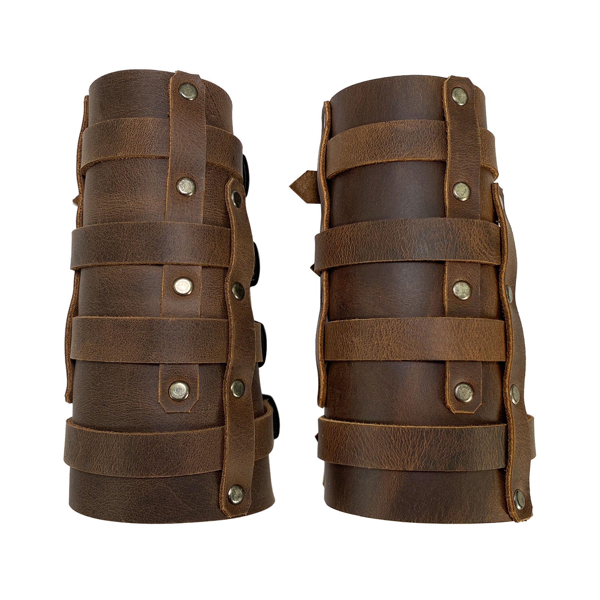 Featuring the 4 Buckle Bracelet (2 Pack) by Valhalla Gear, this side view highlights the adjustable straps on these Viking-style leather armbands, crafted as durable hand protectors for archery. The set captures the essence of great craftsmanship from StockyardX, handcrafted in La Antigua Guatemala & Oaxaca Mexico.