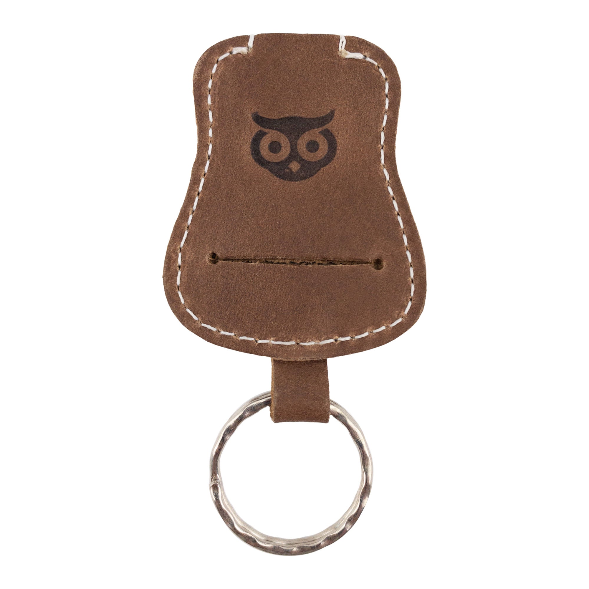 Guitar Keychain by Hide & Drink displayed to highlight its function and unique artistic design. Crafted from Full Grain Leather, this key holder represents the beauty of artisan skills in small batch production from La Antigua Guatemala & Oaxaca Mexico.