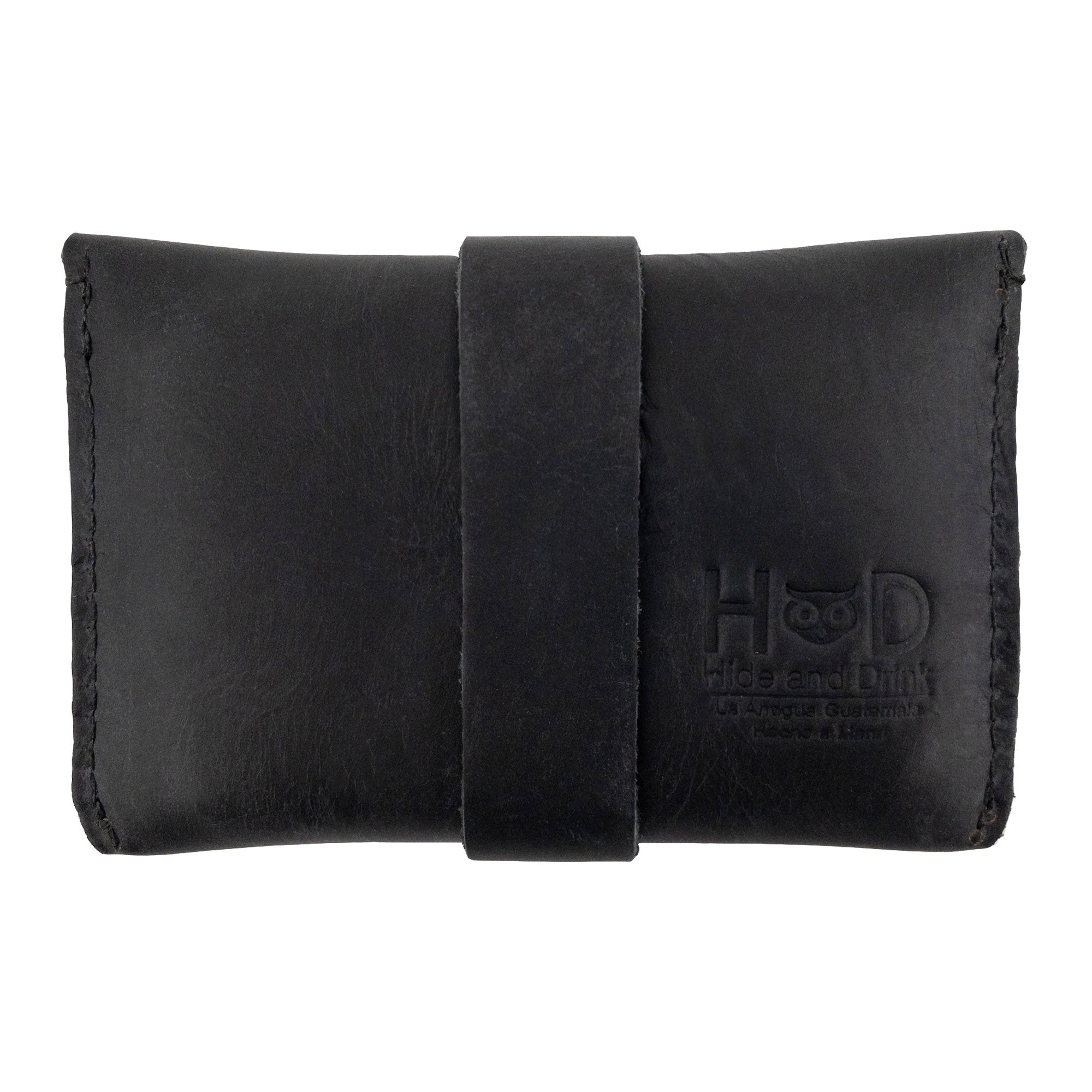 Back view of Hide & Drink's black Credit Card Holder emphasizing craftsmanship and quality. Designed for everyday use, this Full Grain Leather wallet is hand sewn and perfect for those looking for a stylish and minimalist front pocket solution.