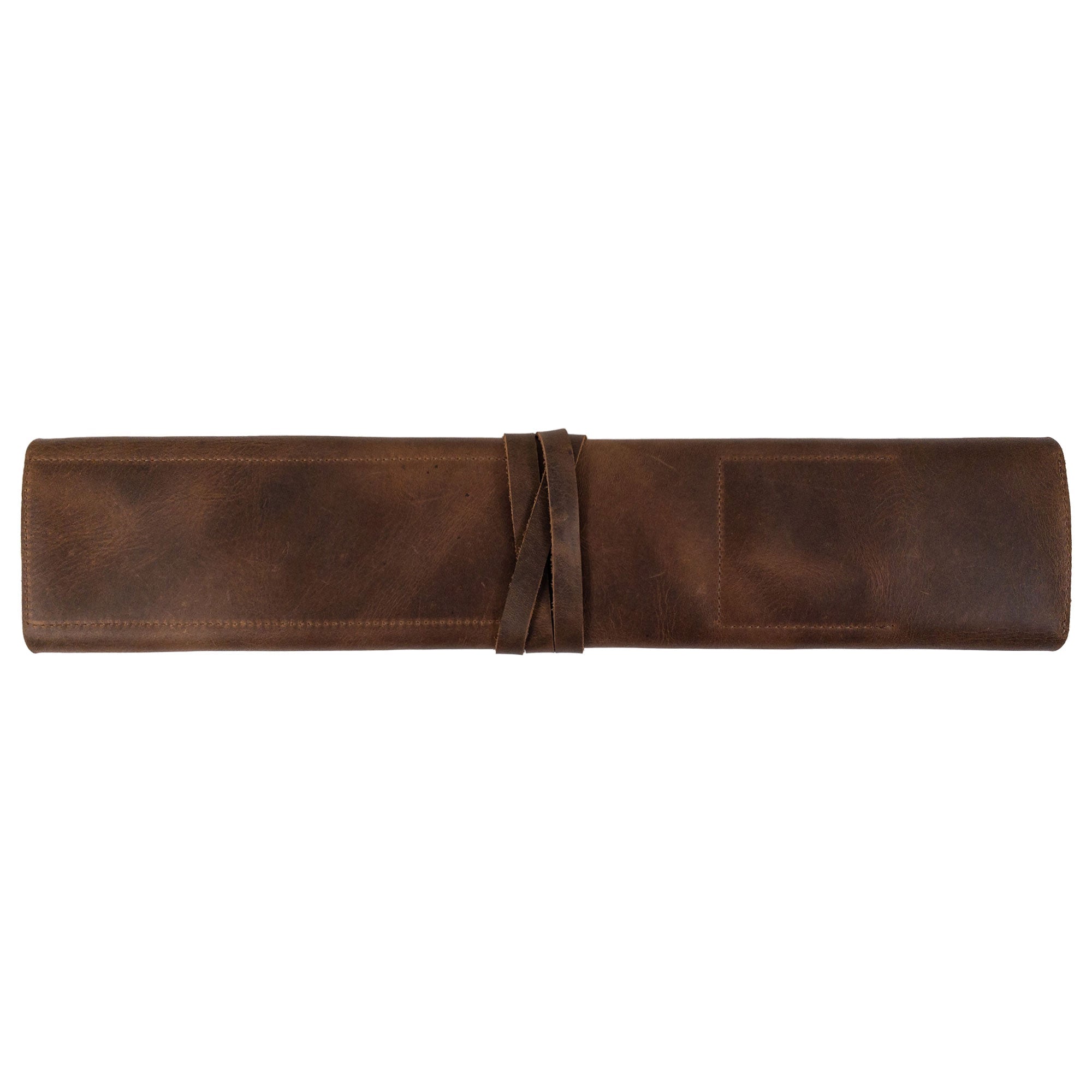 The back view of Hide & Drink’s Drumstick Roll with Slot for Drum Key, crafted from Full Grain Leather. A stylish and practical accessory for drummers, showcasing expert hand cut, hand sewn artistry, and designed with small batch production in mind, all handmade in La Antigua Guatemala & Oaxaca Mexico.
