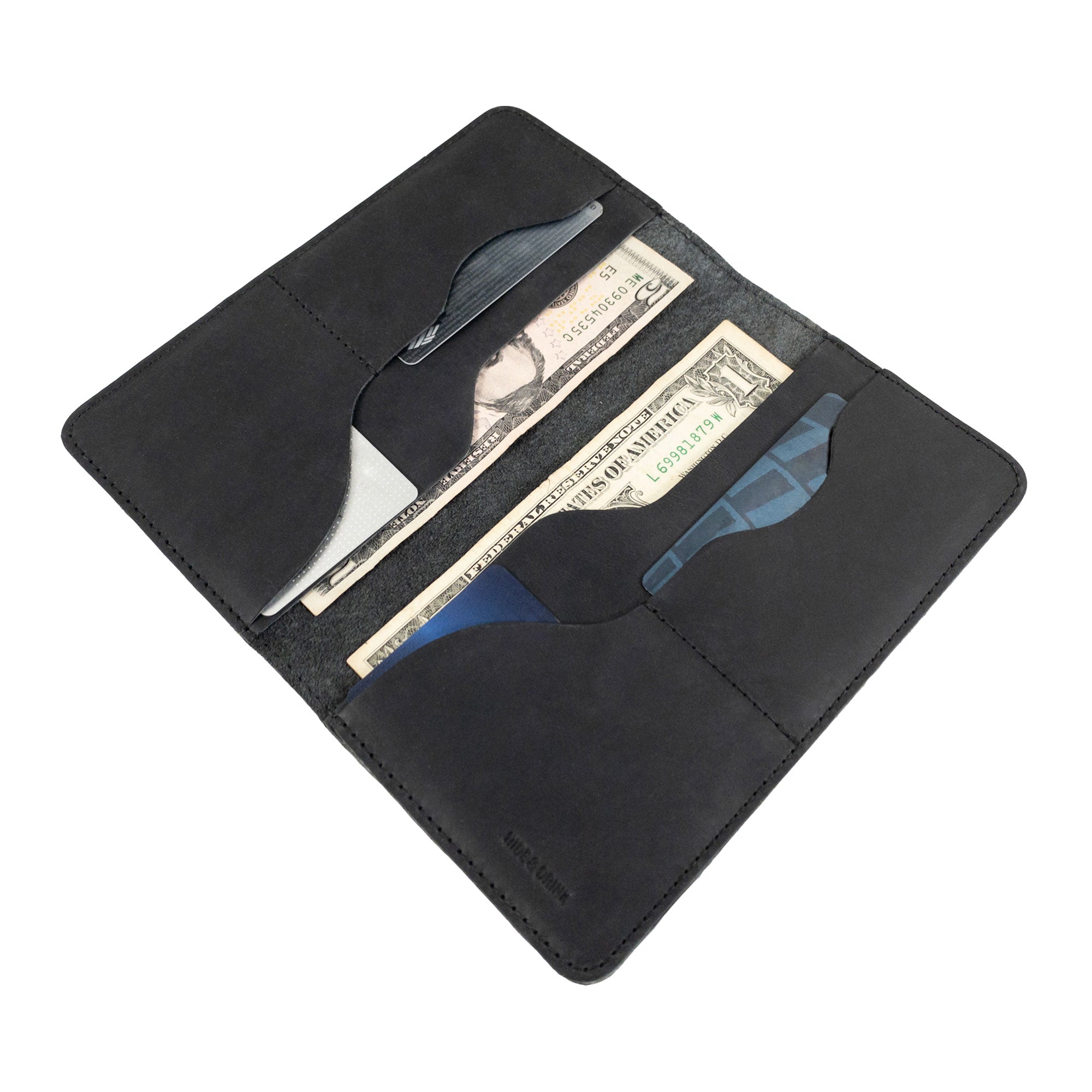 Hide & Drink Large Organizer Wallet, expertly crafted from full grain leather. This artisan bifold wallet provides organized card slots and a flat money holder, making it a perfect travel accessory, handmade in La Antigua Guatemala & Oaxaca Mexico.