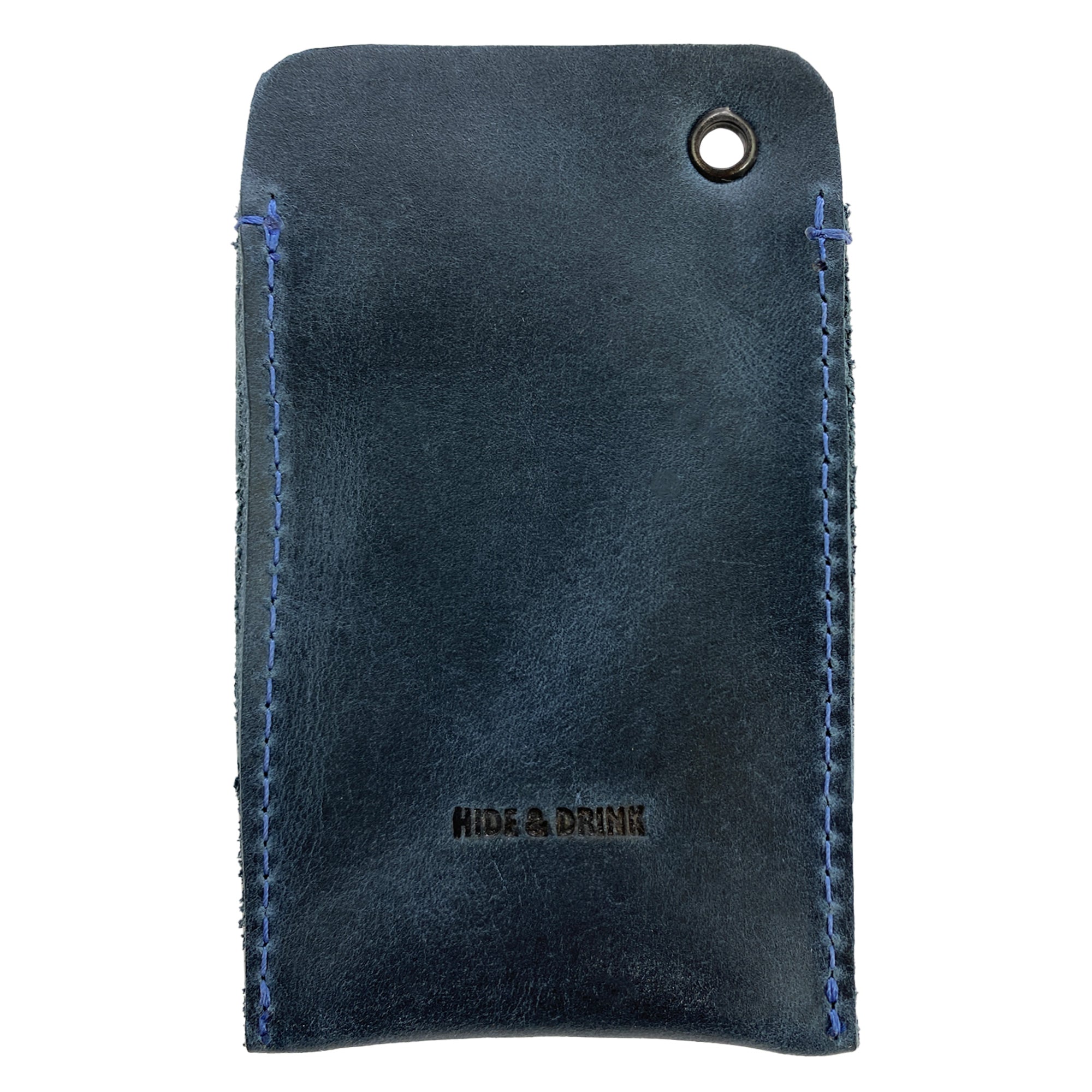 Hide & Drink's Multitool Pocket Sleeve EDC in blue leather, designed for carrying essential tools and pens. This EDC Pocket Slip is a testament to artisan craftsmanship, small batch production, and meticulous attention to detail from La Antigua Guatemala.