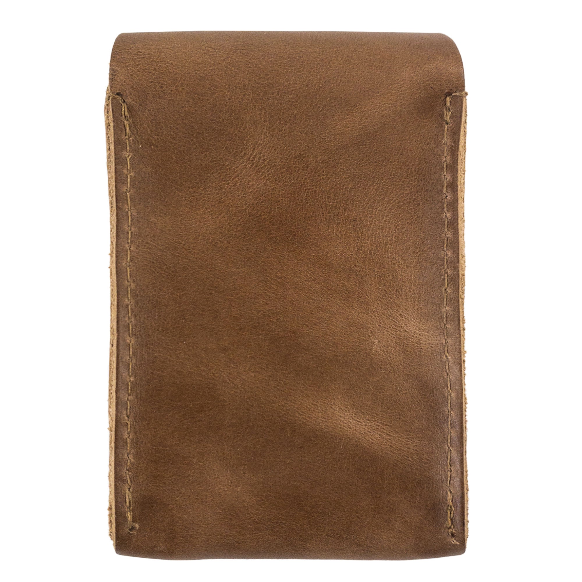The back of Hide & Drink's brown Playing Card Case showcasing its smooth leather surface. This classic case for playing cards (not included) is an ideal storage solution, emphasizing secure craftsmanship in travel accessories made from full grain leather from StockyardX.