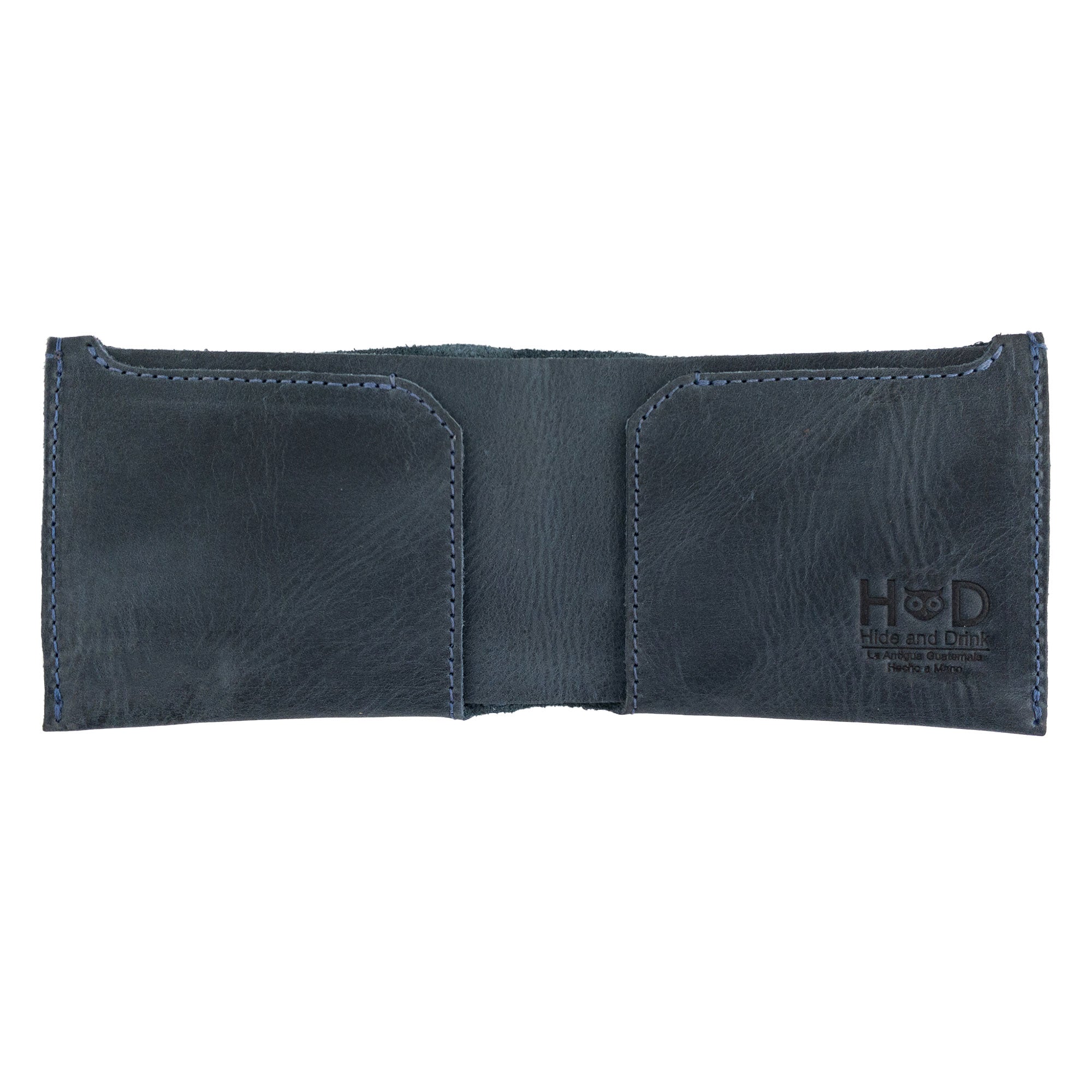 Inside view of the navy blue Hide & Drink Classic Wallet, featuring slots for cards and cash, promoting organization and style. Classic Wallet, Card Organizer, Money Holder, Vintage Pocket, Travel Accessories, Full Grain Leather, StockyardX, Small Batch Production, Hand Cut, Hand Sewn, Fire Branded, Artisan, Handmade in La Antigua Guatemala & Oaxaca Mexico.