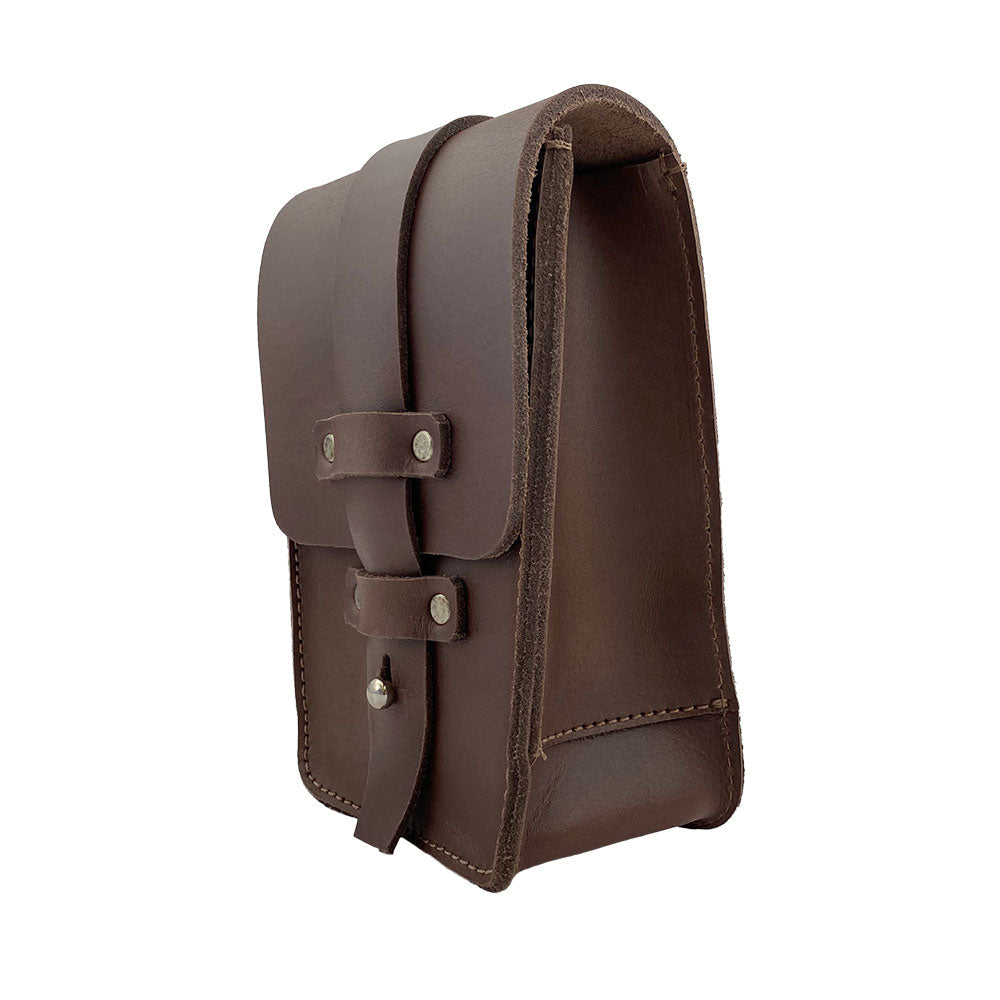 Side view of the Bartender Fanny Pack by Hide & Drink, highlighting its quality construction in thick full grain leather. This artisan-made fanny pack is perfect for bartenders looking for a corkscrew holster and additional storage, handmade in La Antigua Guatemala.
