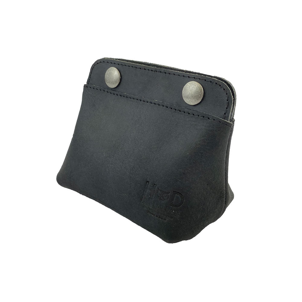 Side angle of Hide & Drink Double Snap Pouch, great for quick access to coins and cash. This artisan-crafted full grain leather piece is handmade in La Antigua Guatemala.