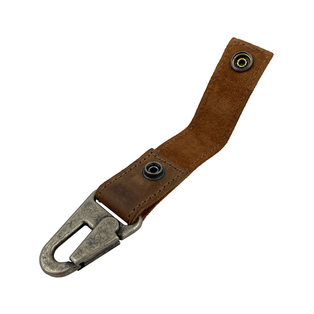 Key Ring Holder by Hide & Drink displayed from a side angle, made with high-quality Full Grain Leather. This artisan-crafted key holder embodies small batch production, with hand cut and hand sewn features, and fire branded aesthetics, handmade in La Antigua Guatemala & Oaxaca Mexico.