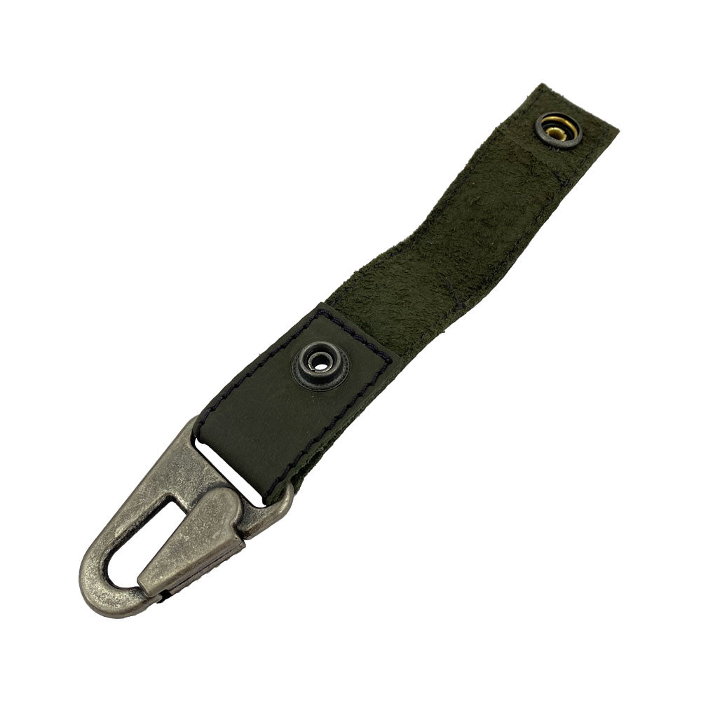 Side view of a stylish Key Ring Holder by Hide & Drink made with Full Grain Leather and metal accents. This handmade product is a part of StockyardX's small batch production, highlighting hand-cut and hand-sewn craftsmanship, fire branded for quality, and artisan production in La Antigua Guatemala & Oaxaca Mexico.