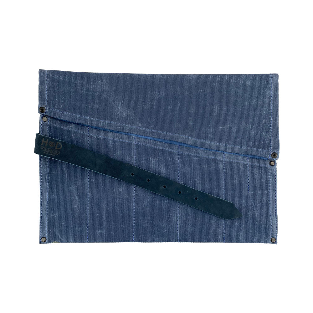 An elegant Large Tool Roll from Hide & Drink, perfect for tool organization. This Portable Carry-On Pouch features 6 slots designed for woodworking tools. Crafted from high-quality waxed canvas and full grain leather variations, this artisan piece represents small batch production, hand cut and hand sewn in La Antigua Guatemala & Oaxaca Mexico.