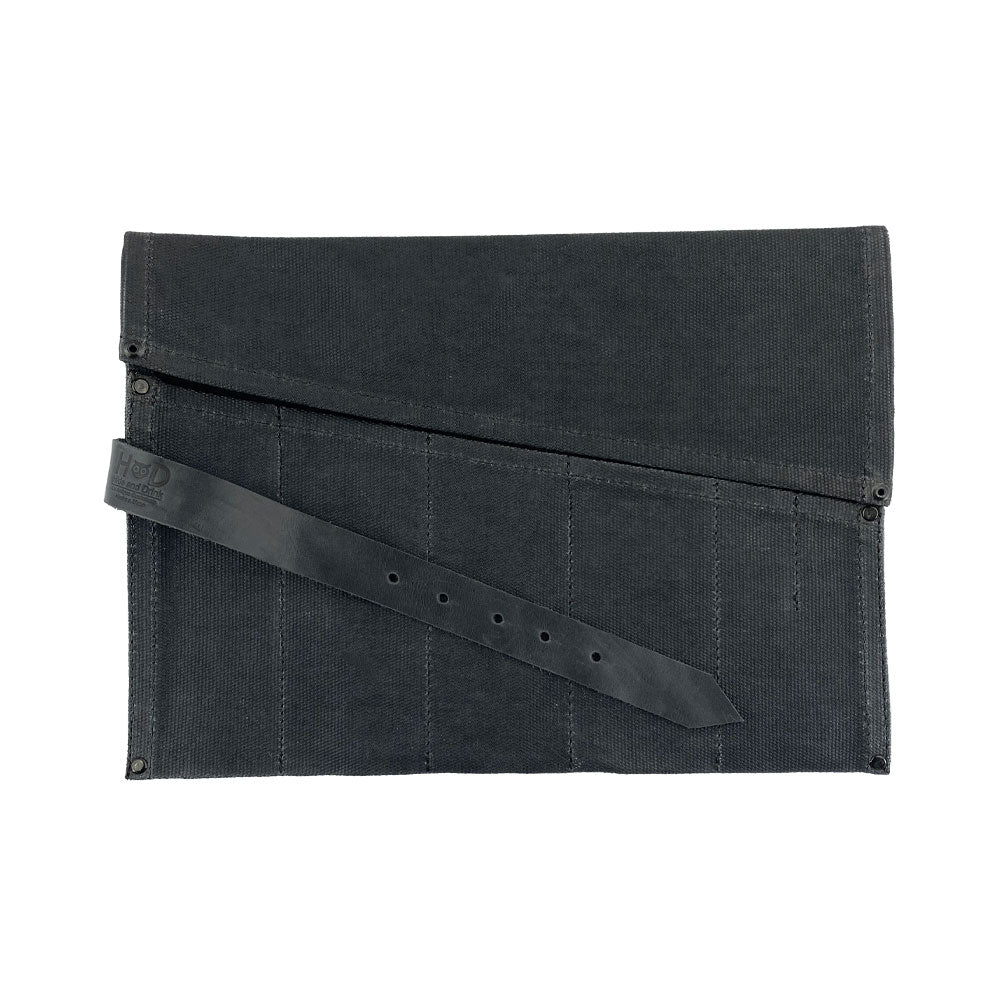 Hide & Drink's Large Tool Roll featuring an artisan design for tool storage. This Portable Carry-On Pouch has 6 slots for woodworking tools organization. Made from durable waxed canvas and full grain leather variations, this artisan product emphasizes small batch craftsmanship, hand cut and hand sewn in La Antigua Guatemala & Oaxaca Mexico.