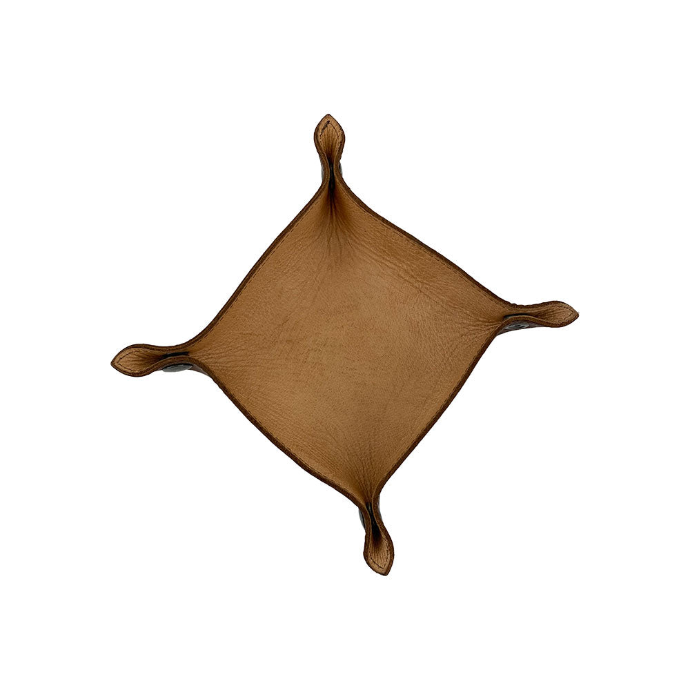 Hide & Drink Valet Tray displayed with a unique shape, showcasing the artisan craftsmanship of full grain leather. Great for keys and change, handmade in La Antigua Guatemala & Oaxaca Mexico, Catchall Change Key Wallet Coin Box Tray Storage Valet, Full Grain Leather, StockyardX, Small Batch Production, Hand Cut, Hand Sewn, Fire Branded, Artisan.