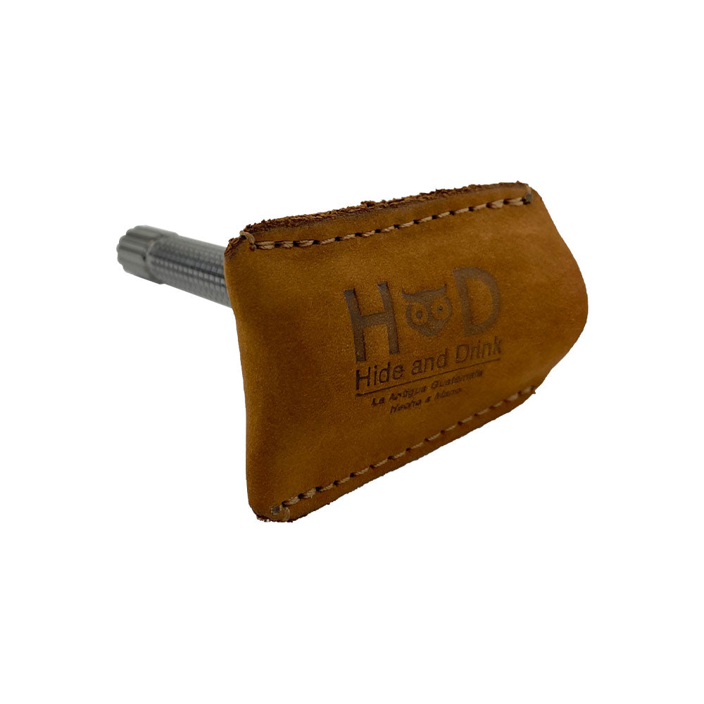 Hide & Drink Razor Head Cover displayed with a full grain leather protective sheath for Double Edge Safety Razor Head, showcasing artisan craftsmanship from La Antigua Guatemala. This shaving travel cover is hand cut, hand sewn, and fire branded.