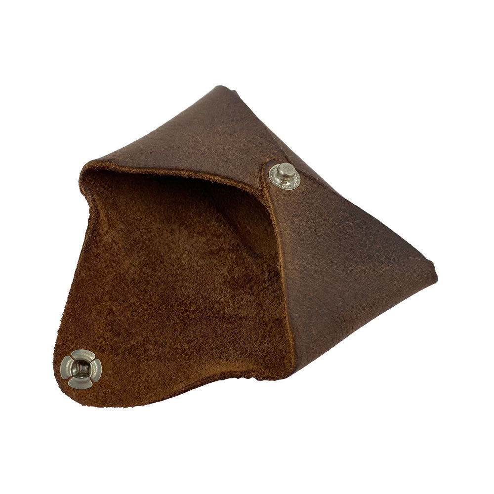 Inside view of the Hide & Drink Envelope Coin Case displaying its unique envelope shape and rustic leather interior. Handmade from full grain leather, this piece emphasizes small batch production and artisan excellence in La Antigua Guatemala & Oaxaca Mexico.