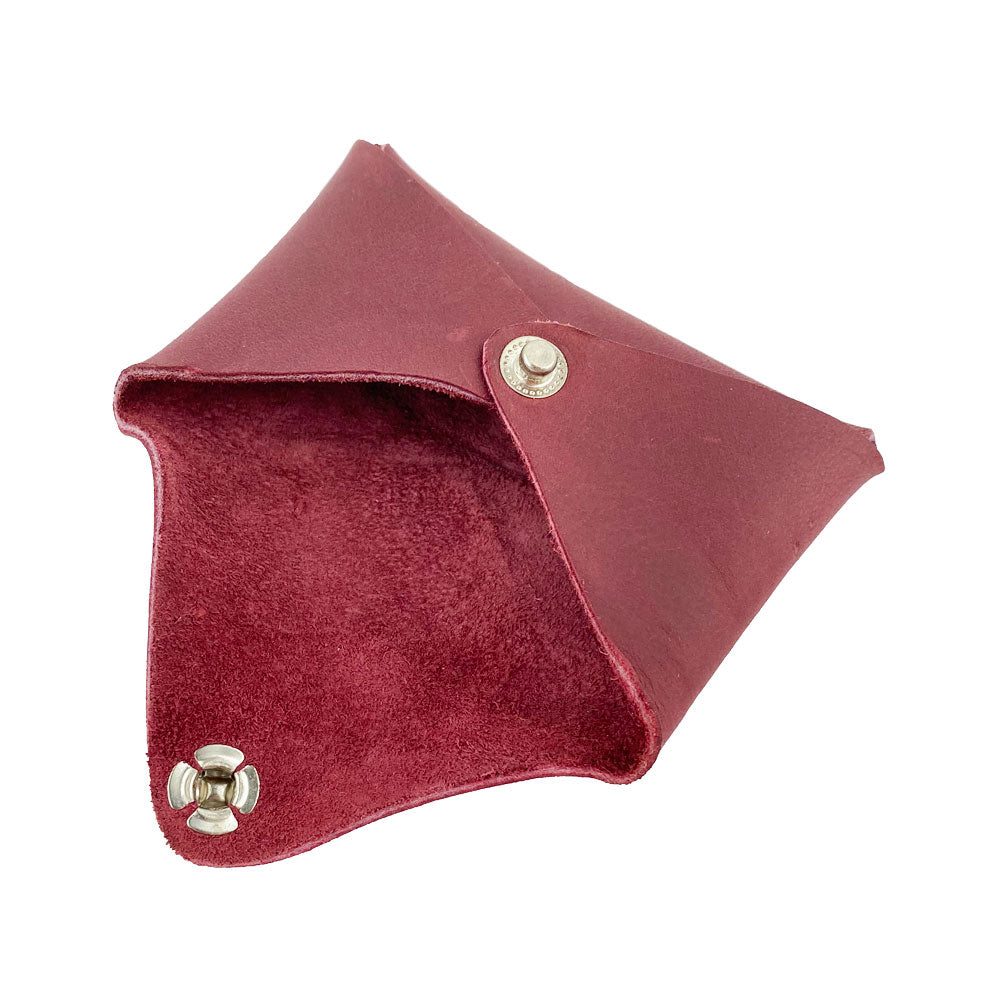 Inside view of the Hide & Drink Envelope Coin Case in burgundy, highlighting its unique design and artisan quality. This item is crafted from full grain leather, representing small batch production in La Antigua Guatemala & Oaxaca Mexico.