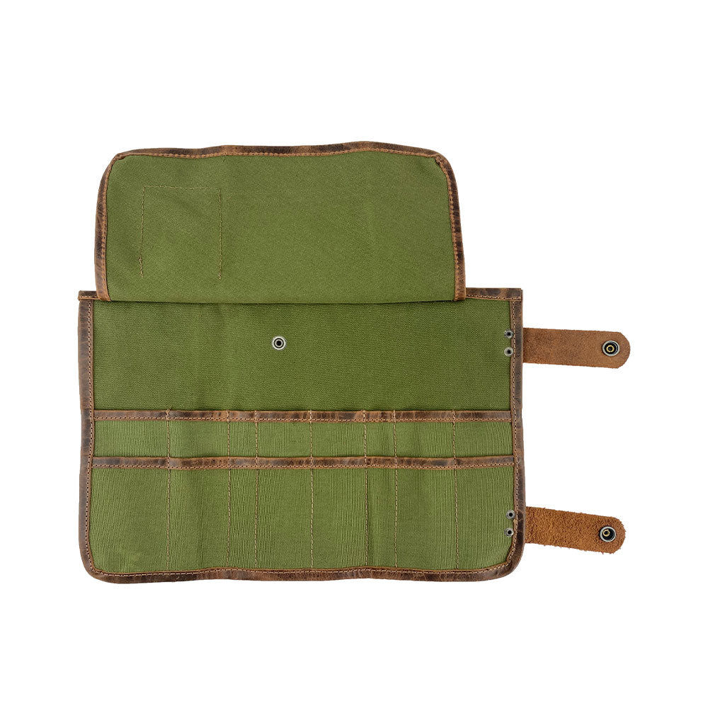 Hide & Drink's Barber Tool Roll, an excellent Snap Tool Roll Up Bag with 14 Slots convenient for storing scissors & screwdrivers. Made from Full Grain Leather, this portable carry case reflects StockyardX's commitment to small batch production and artisan craftsmanship, hand cut, hand sewn, and fire branded in La Antigua Guatemala & Oaxaca Mexico.