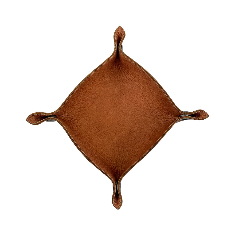Unique Valet Tray with Sheep Skin by Hide & Drink, featuring a classic design that allows for tidy storage of personal items like wallets and coins. The durable full grain leather and sheepskin material make this catchall an excellent choice for everyday use. It is hand cut, hand sewn, and fire branded, highlighting artisan quality produced in small batches that is ideal for all home and travel essentials.