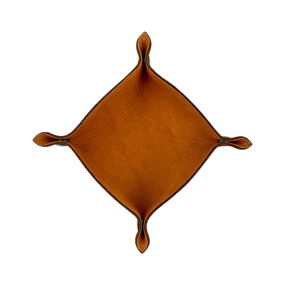 Top view of the Valet Tray with Sheep Skin by Hide & Drink, demonstrating its unique design. This handcrafted catchall is great for keys, change, and other personal items. Made from Full Grain Leather & Sheepskin, this artisan piece is perfect for your storage needs and handmade in La Antigua Guatemala & Oaxaca Mexico.