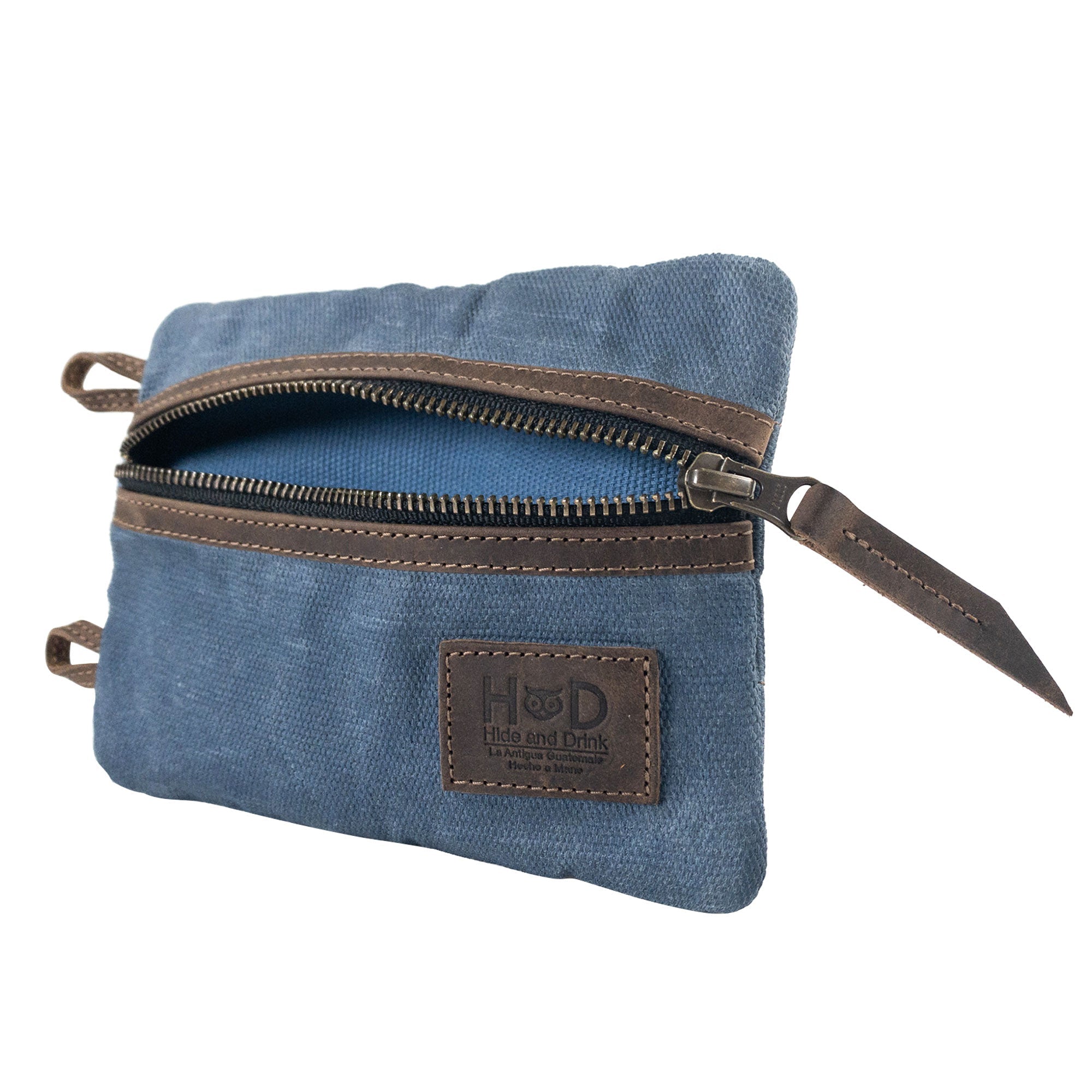 Multi-tool Pocket Pouch - XL by Hide & Drink filled with various tools, showcasing its practical use in DIY projects or camping activities. Multi-Tool Pocket Pouch XL, Compact Multipurpose EDC Zippered Bag, Knife Holster, Handmade Slim Organizer, Waxed Canvas, StockyardX, Small Batch Production, Artisan, Handmade in La Antigua Guatemala & Oaxaca Mexico.