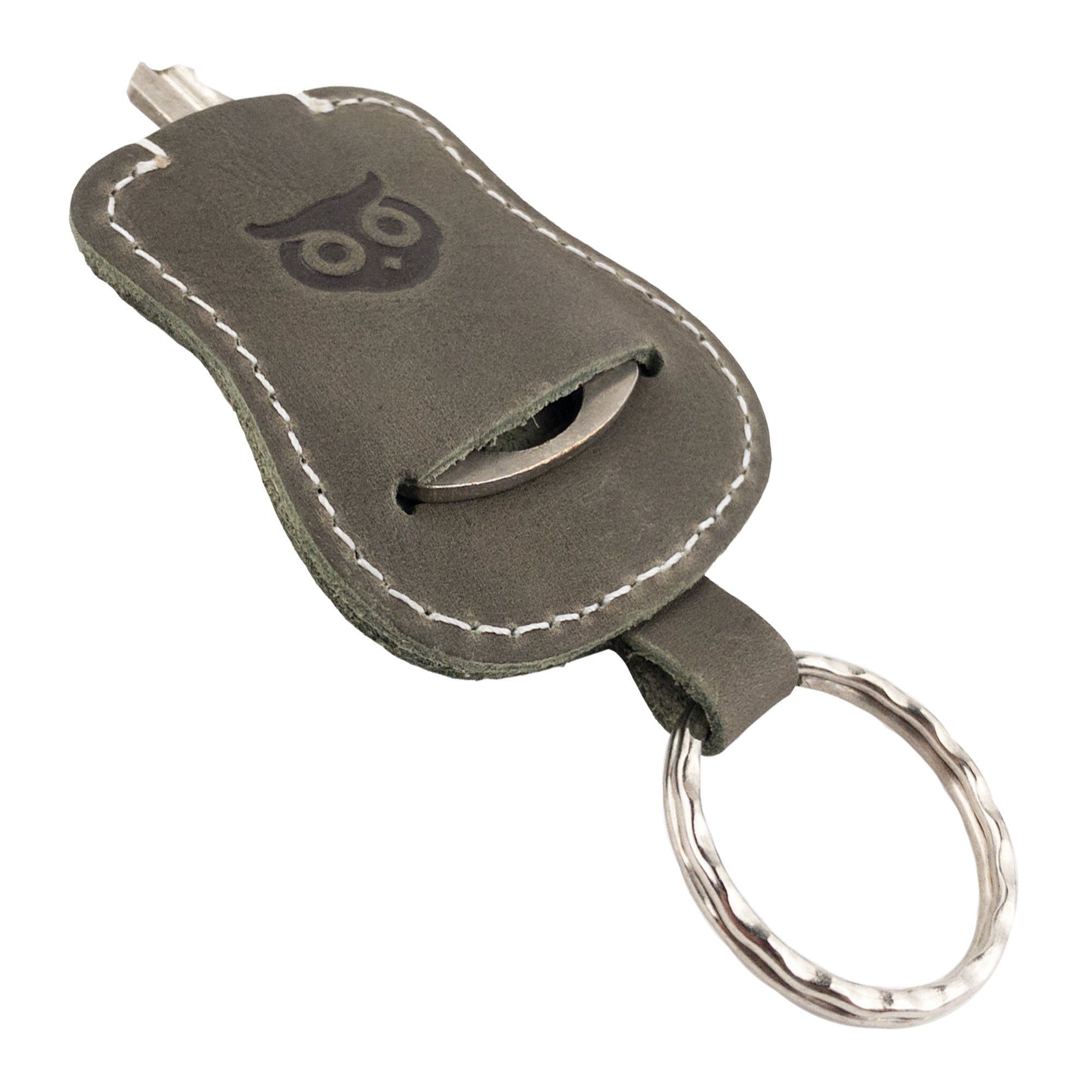 Stylish gray Guitar Keychain by Hide & Drink, emphasizing its clever design for key access. Made from durable Full Grain Leather, this keyring is a perfect example of artisan craftsmanship from small batch production in La Antigua Guatemala & Oaxaca Mexico.