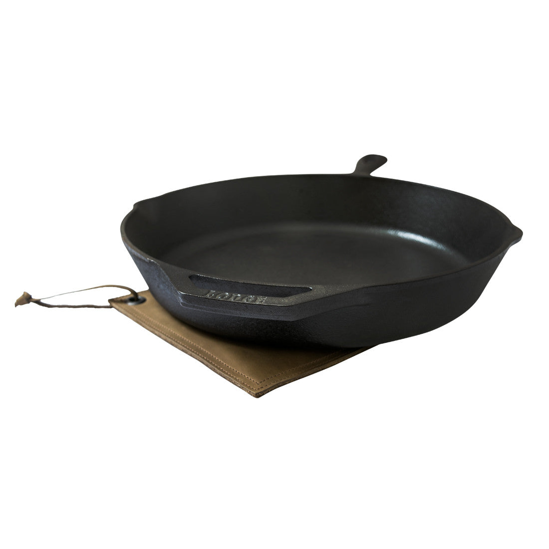 Side view of the Hide & Drink Pot Pad, highlighting its handmade craftsmanship. This rustic leather hot pot pad is ideal for safe handling of hot cookware.