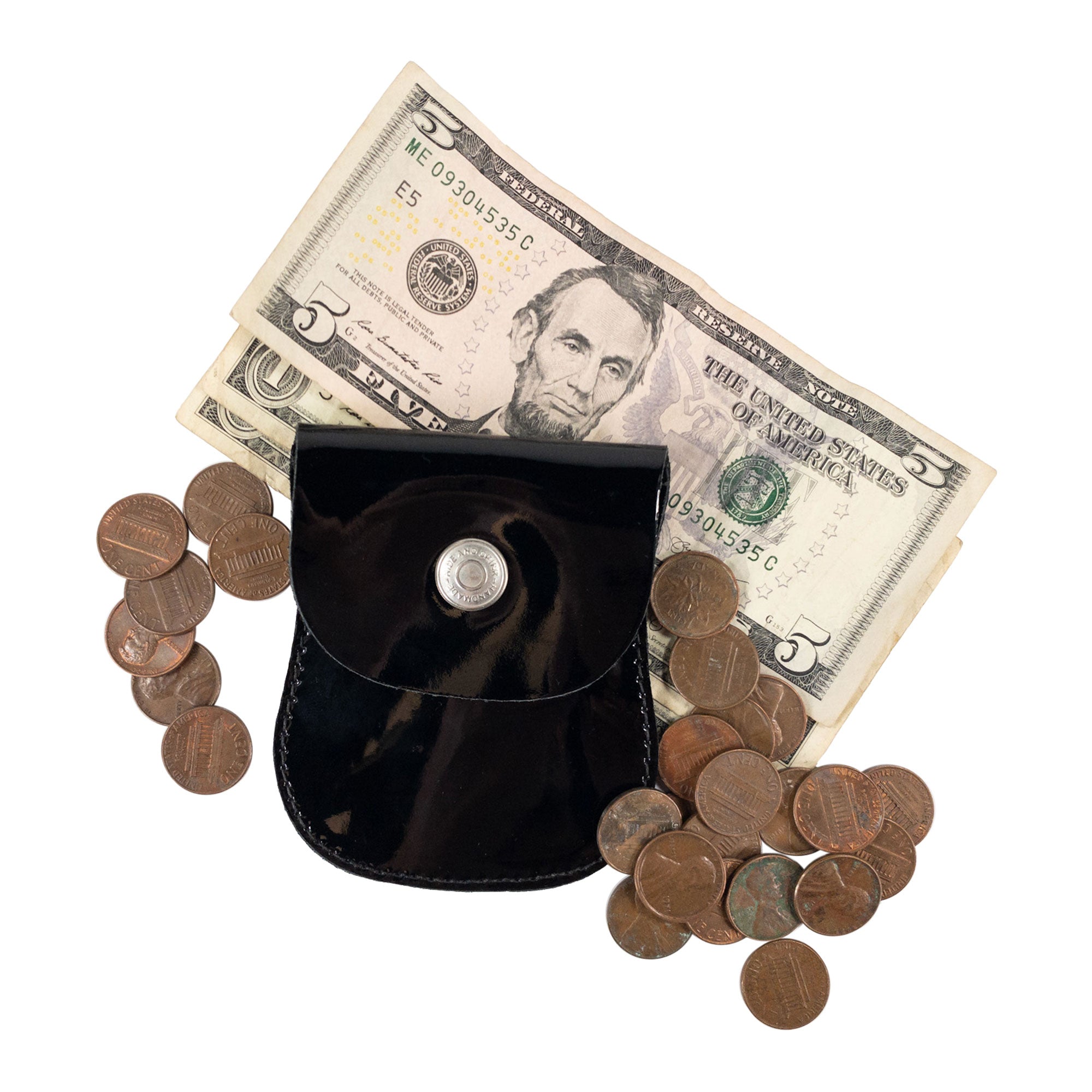 The Curvy Coin Pouch by Hide & Drink with a five-dollar bill and coins, emphasizing its rustic charm and functionality as a pocket case for pennies and handmade travel accessory.