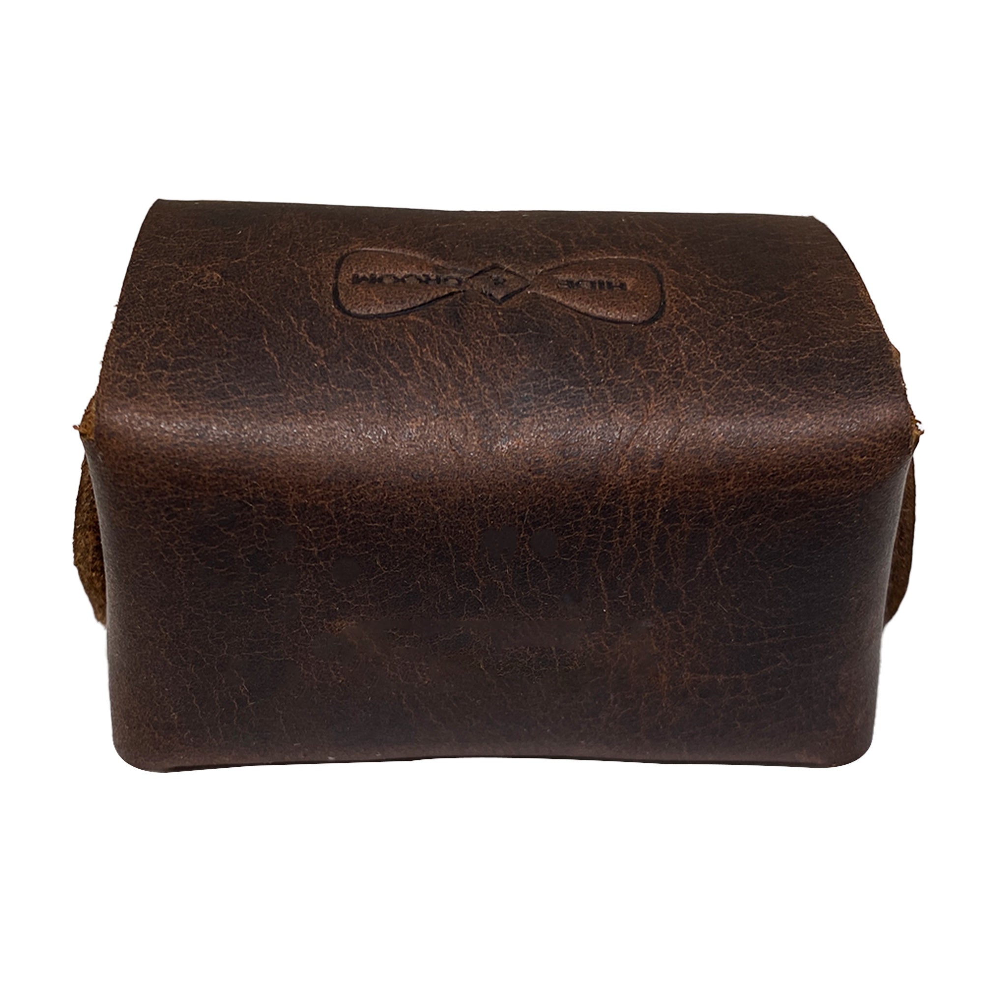 Back view of a rustic cufflinks case by Hide & Groom, revealing the high-quality finish and fire-branded design. This stylish cufflinks case is ideal for keeping men's accessories organized and secure. Rustic Cufflinks Case - Protective Storage for Shirt Studs, Men's Accessories, Full Grain Leather, StockyardX, Small Batch Production, Hand Cut, Hand Sewn, Fire Branded, Artisan, Handmade in La Antigua Guatemala & Oaxaca Mexico.