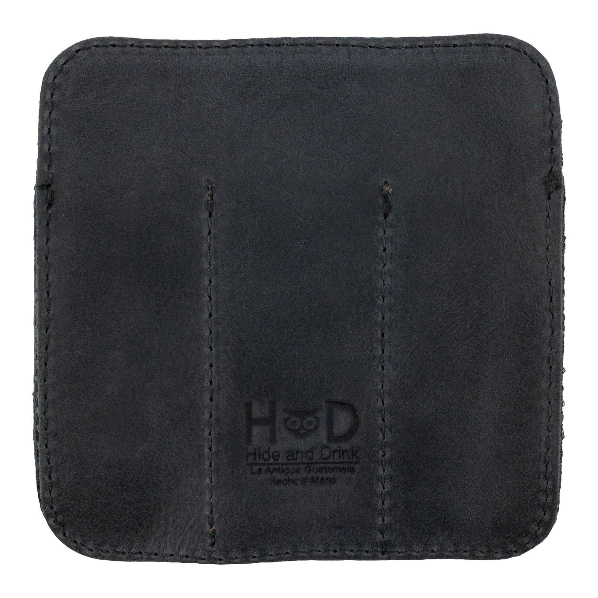 Reverse side of the Hide & Drink Minimalist Tool Pocket featuring its branding. This durable Tool Pocket Pouch made from Full Grain Leather represents the artisan craftsmanship of StockyardX, emphasizing handmade quality from La Antigua Guatemala in small batch production.