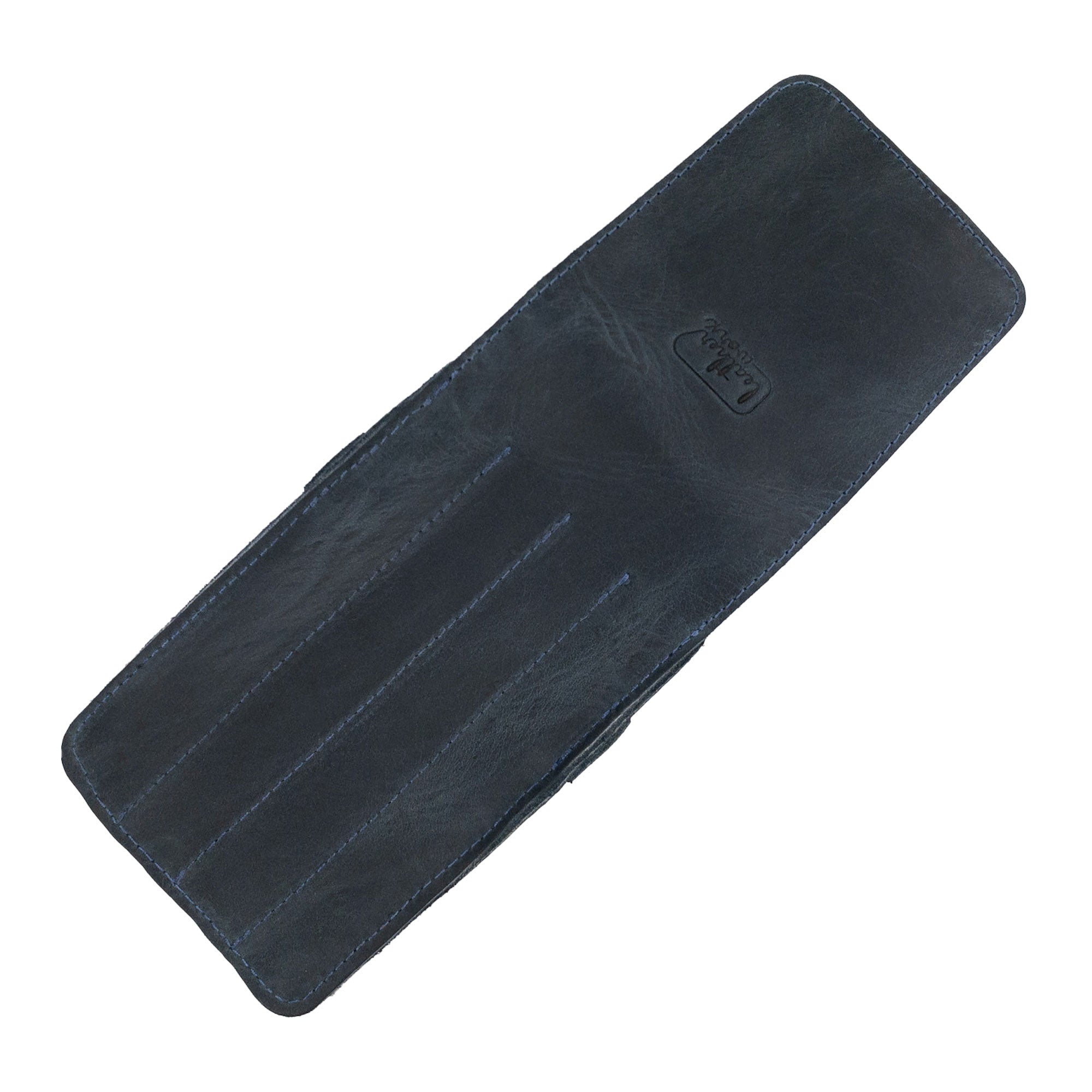 Side angle of the Leather Worx 4-Pen Holder in navy full grain leather, exemplifying its sleek and functional minimalist style. This artisan-crafted pencil case represents small batch production with hand sewn quality and fire branding, all made in La Antigua Guatemala.