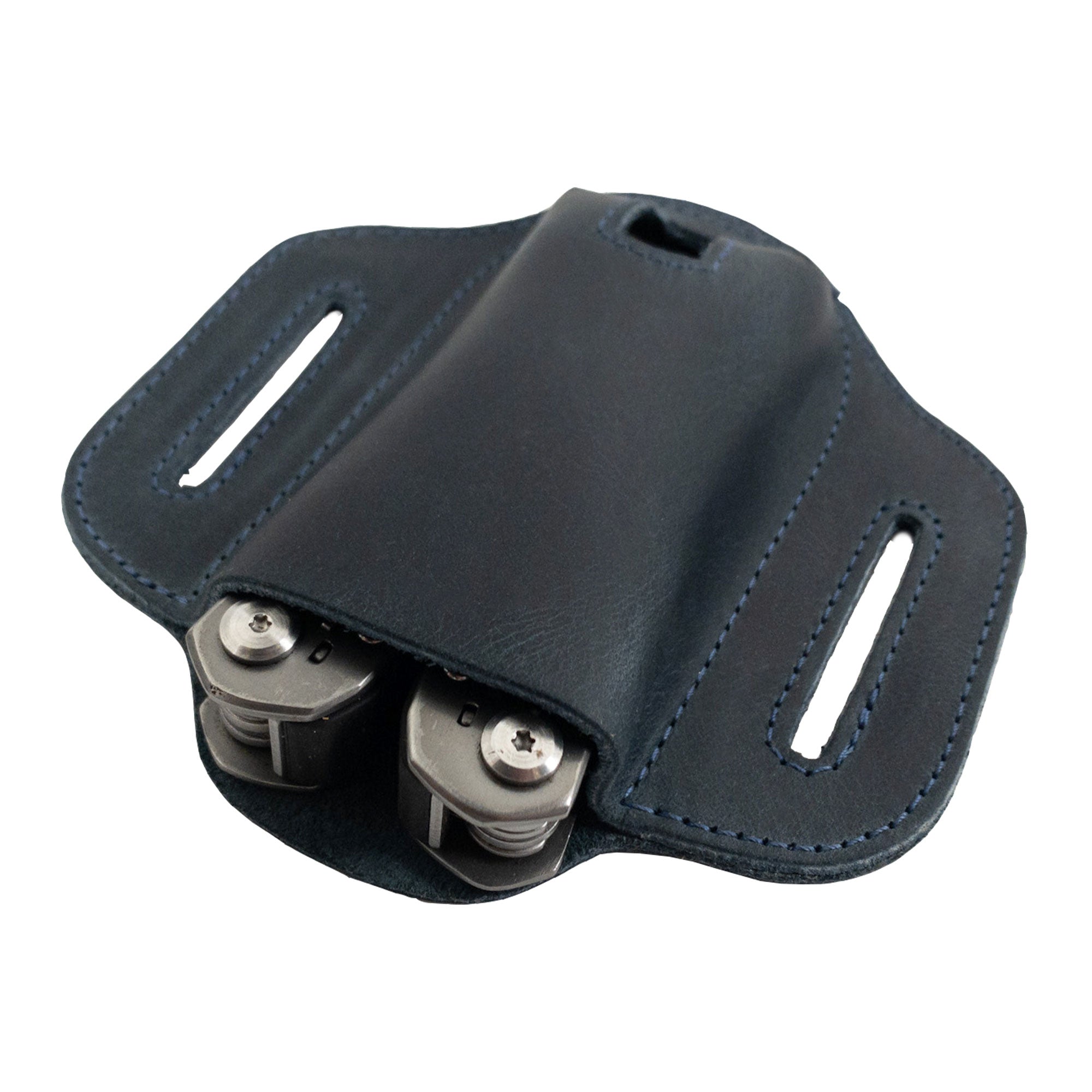 Close-up of the navy Multitool Belt Sheath from Hide & Drink displaying secured tools. This handy multi-tool holder for belt is designed with full grain leather, promoting its practical use as an outdoor accessory, artisan-crafted for quality.