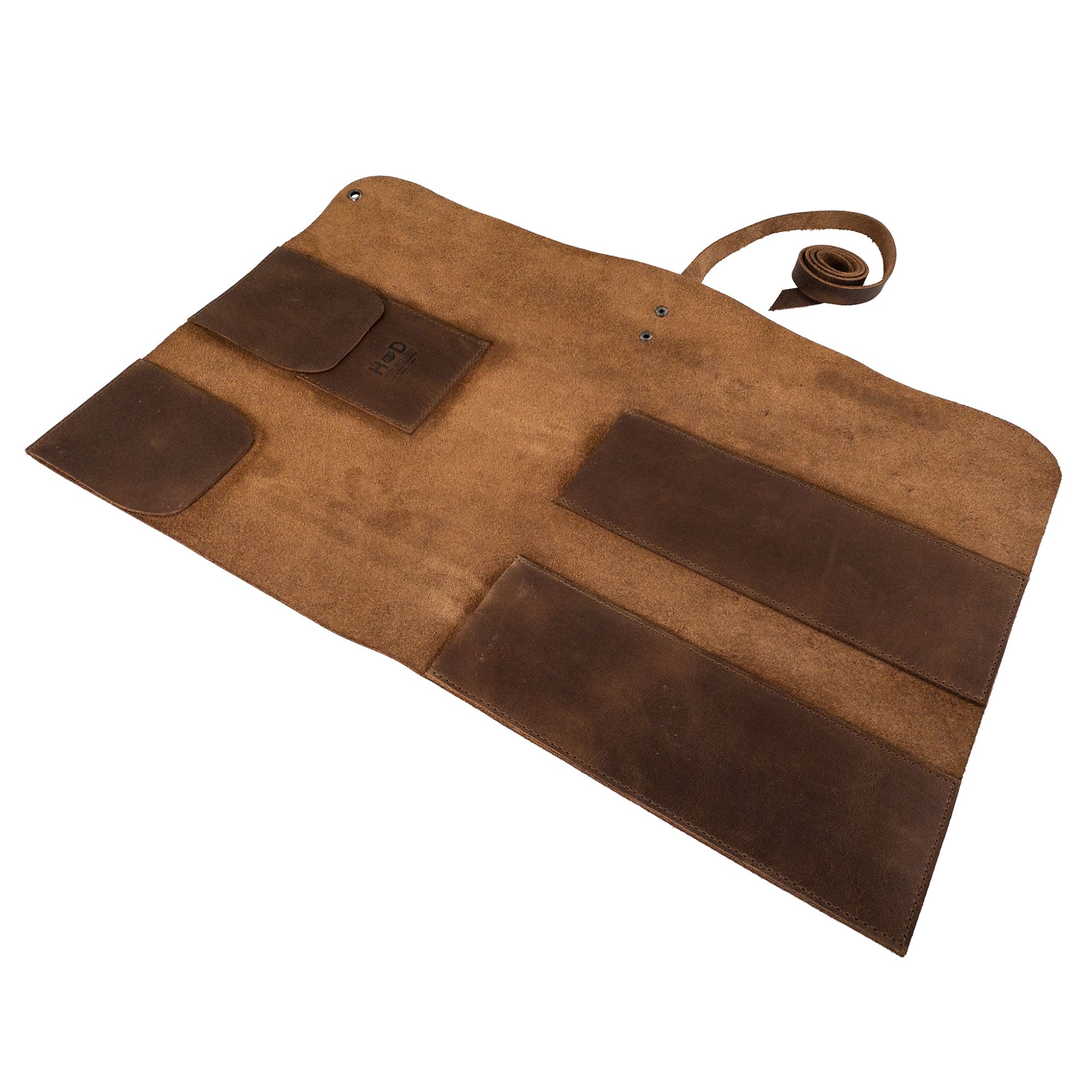 Inside Hide & Drink’s Drumstick Roll with Slot for Drum Key, this image displays organized leather compartments, made from Full Grain Leather. Ideal for drummers, this handmade item features exquisite craftsmanship through small batch production, hand cut and hand sewn techniques, crafted in La Antigua Guatemala & Oaxaca Mexico.