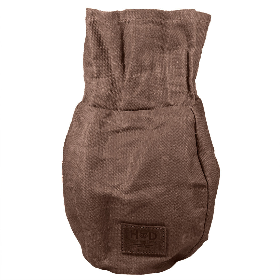 Bushcraft Tinder Bag by Hide & Drink, showcasing its unique Waxed Canvas structure. This water resistant outdoor pouch is perfect as a multipurpose camping accessory, highlighting small batch production with artisanal hand cut and hand sewn quality. Handmade in La Antigua Guatemala & Oaxaca Mexico.