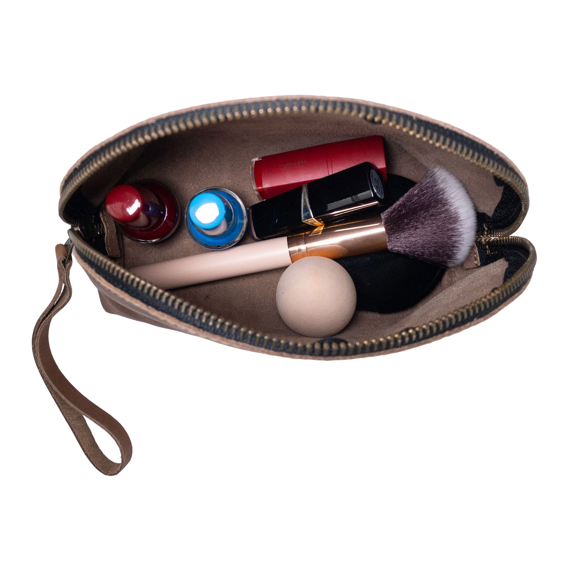 Angle view of the Accessory Pouch Organizer Hand Bag from Hide & Drink in brown leather. This durable Cosmetic Travel Organizer with Hand Strap for Women works as a reliable Makeup Bag and Classic Handbag, reflecting artisan quality from La Antigua Guatemala & Oaxaca Mexico.