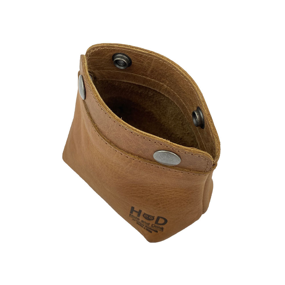 Interior view of the Hide & Drink Double Snap Pouch, perfect for use as a makeup organizer or cash & card holder. Hand sewn from full grain leather, it's a prime example of artisan craftsmanship from La Antigua Guatemala.