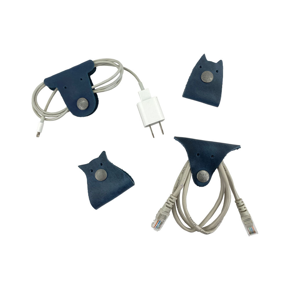 Furry Friends Cord Keeper (4-Pack) showcasing cute and practical designs, made from full grain leather by Hide & Drink for cable organization. Furry Friends 4-Pack Cord Keeper (Cord Clam), Full Grain Leather, StockyardX, Small Batch Production, Hand Cut, Hand Sewn, Fire Branded, Artisan, Handmade in La Antigua Guatemala & Oaxaca Mexico.