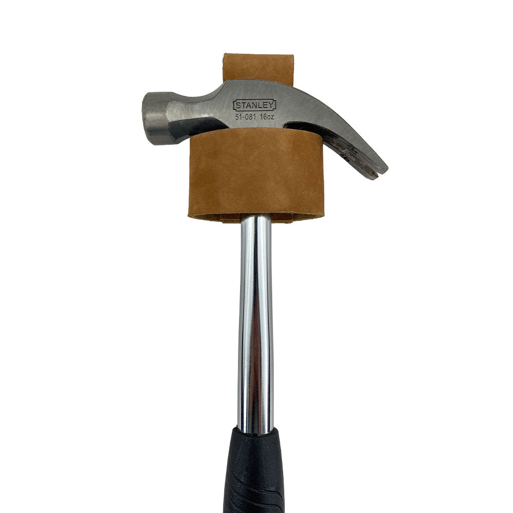 Large Hammer Holster by Hide & Drink, focusing on the detailed craftsmanship of the leather. This sturdy waist axe holster is built for woodworking professionals seeking reliability. Handmade in Oaxaca Mexico, this rustic tool organizer stands out with artisan quality.