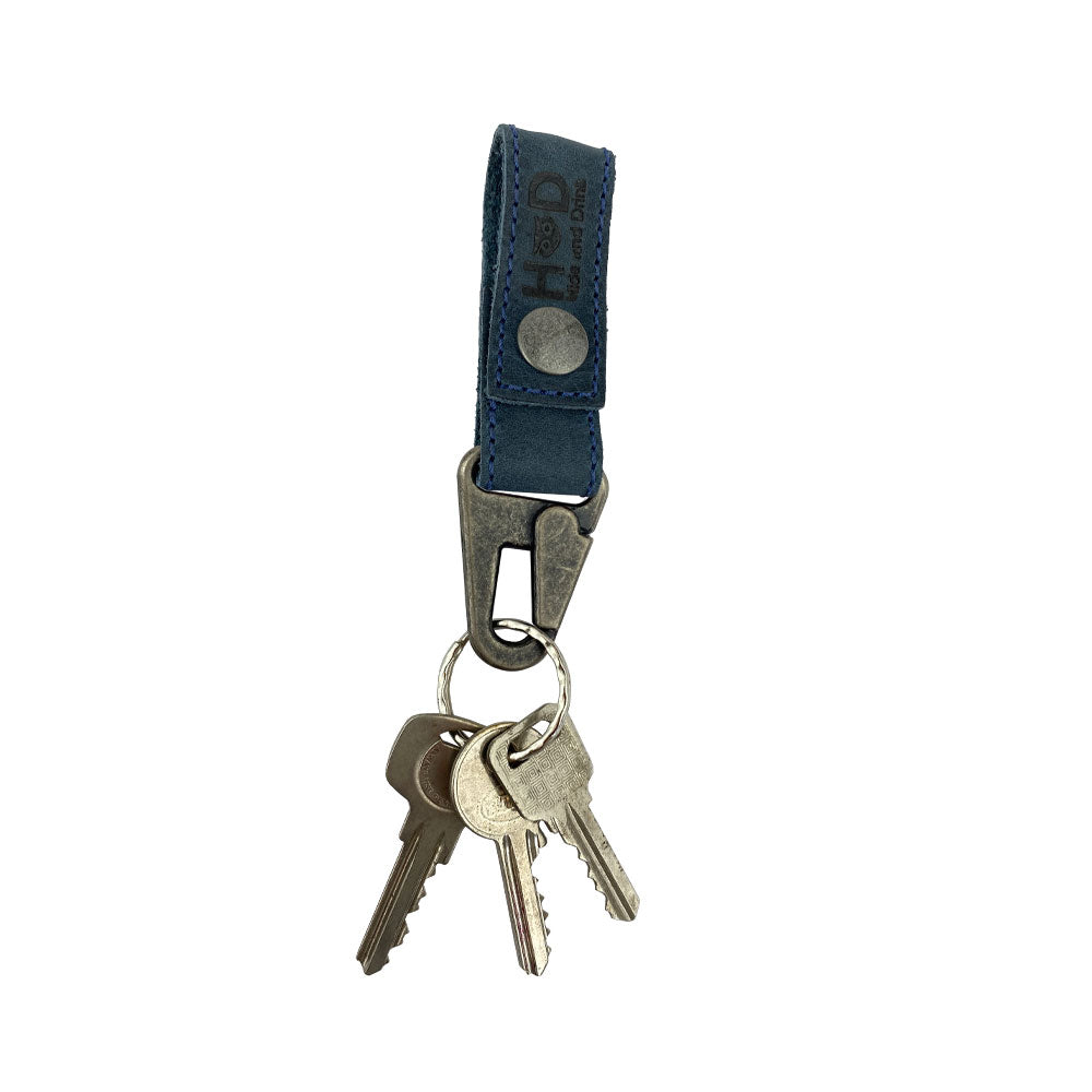 Key Ring Holder by Hide & Drink with keys attached, showcasing its functionality. Made from Full Grain Leather, this holder highlights Small Batch Production and artisan techniques. Handmade in La Antigua Guatemala & Oaxaca Mexico.