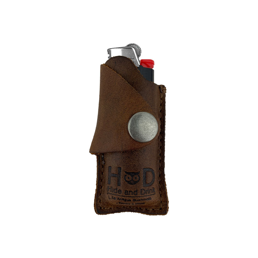 Hide & Drink Lighter Protective Case featuring a full grain leather exterior with a sleek finish, ideal for protecting your lighter in style. Artisan crafted in La Antigua Guatemala & Oaxaca Mexico, ensuring each piece is unique. Includes keywords: Lighter Protective Case, Full Grain Leather, StockyardX.