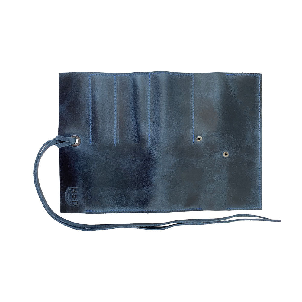 Close-up of the elegant Hide & Drink Multi Purpose Pencil Roll showcasing its rustic leather texture. Perfect for keeping tools organized while emphasizing quality and artisanal craftsmanship.