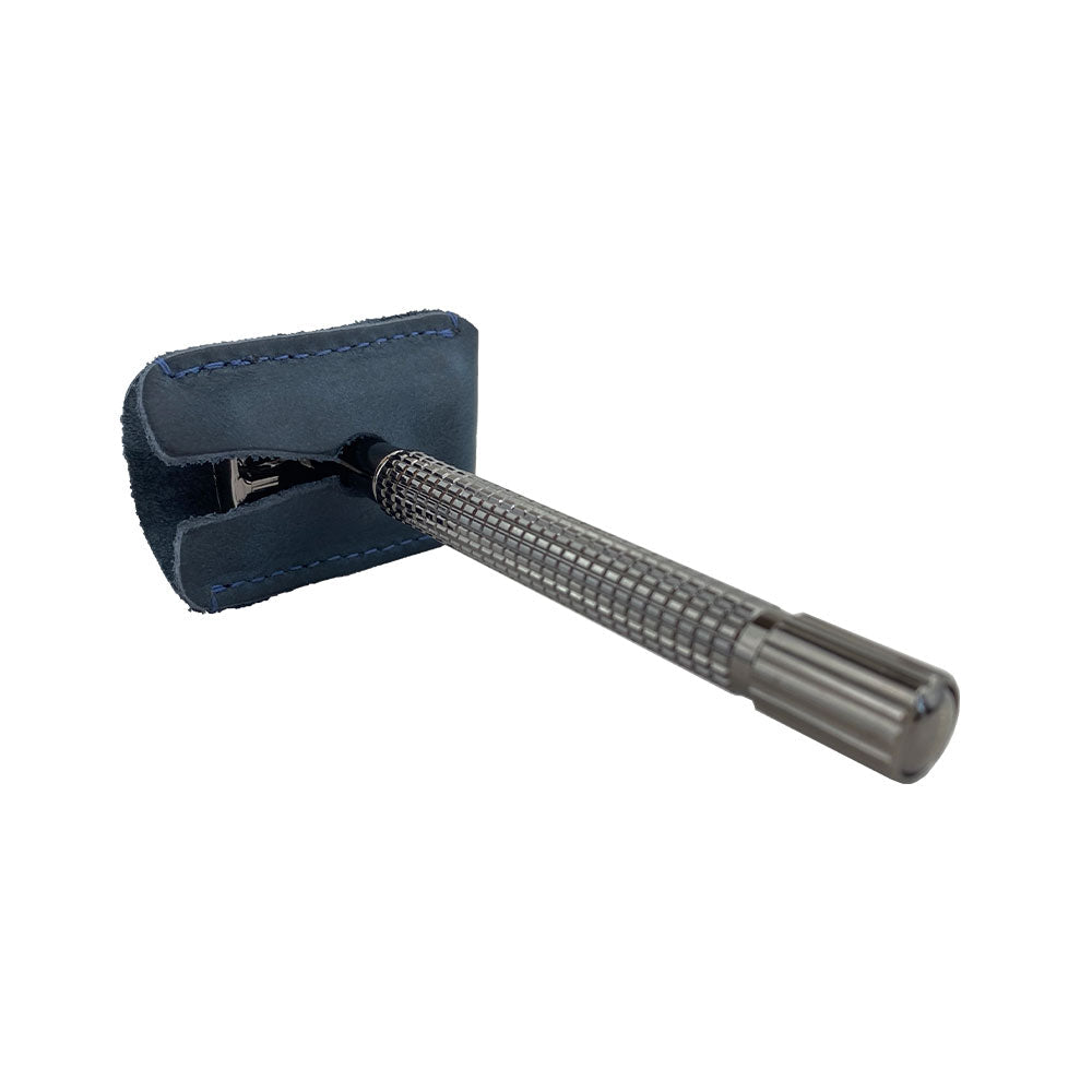 Back view of a double edge safety razor with a Razor Head Cover by Hide & Drink, highlighting the full grain leather design that provides protection for your razor head. This shaving travel cover is handcrafted, featuring artisan details such as fine stitching and fire branding from small batch production in La Antigua Guatemala.