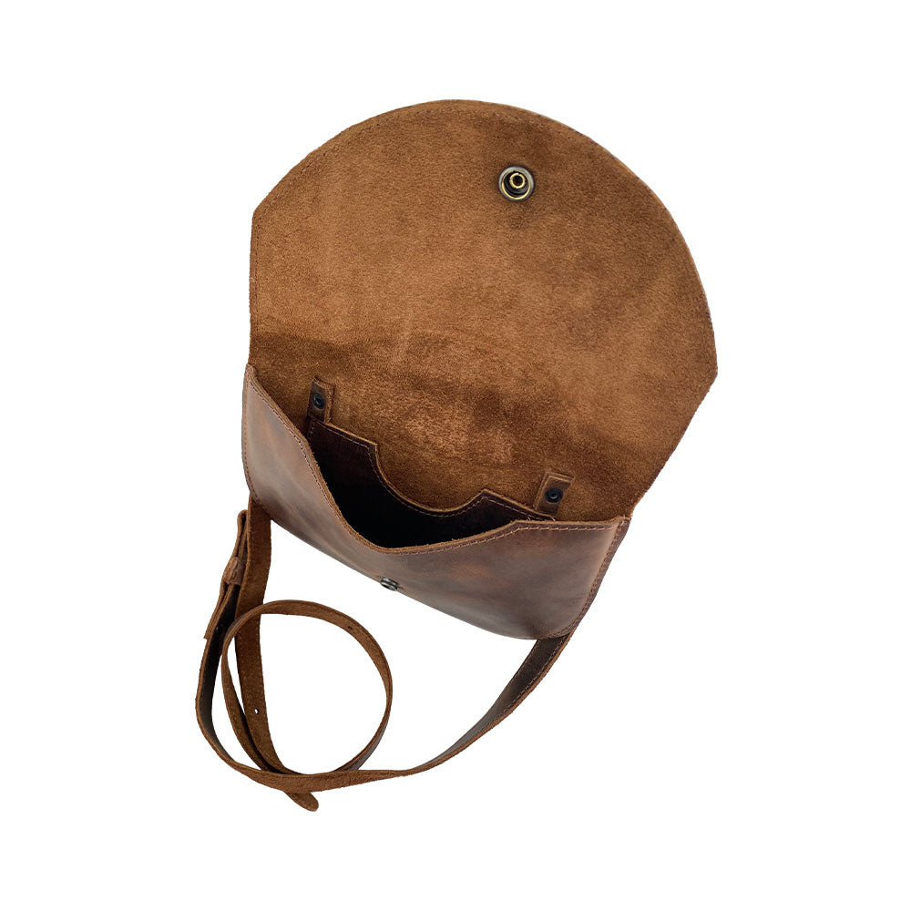 Inside view of the Hide & Drink Hip and Shoulder Bag, featuring rich Full Grain Leather and demonstrating exceptional artisan quality. This bag is part of Small Batch Production, hand cut and hand sewn for durability and style. Handmade in La Antigua Guatemala & Oaxaca Mexico.