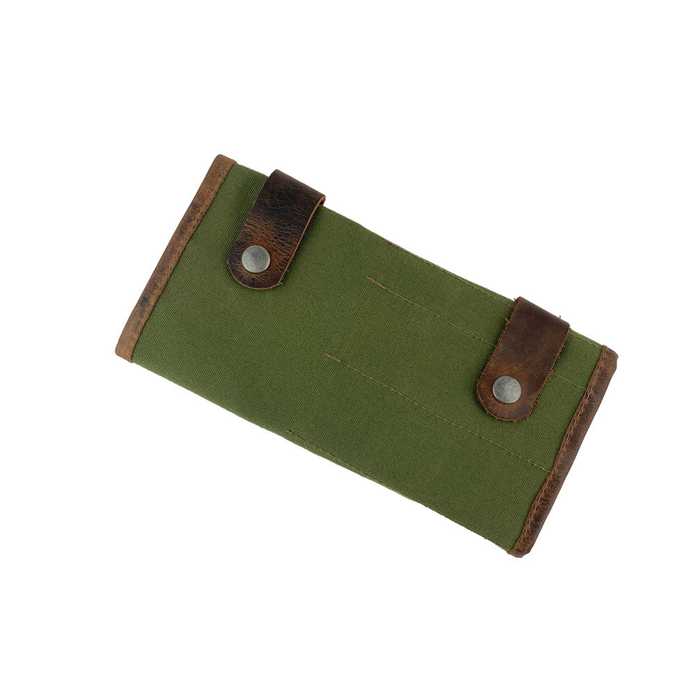 Hide & Drink showcases its Barber Tool Roll, featuring a Snap Tool Roll Up Bag with 14 Slots designed for scissors & screwdrivers. Made from Full Grain Leather, this portable carry case represents StockyardX's small batch production and artisan craftsmanship, hand cut, hand sewn, and fire branded in La Antigua Guatemala & Oaxaca Mexico.