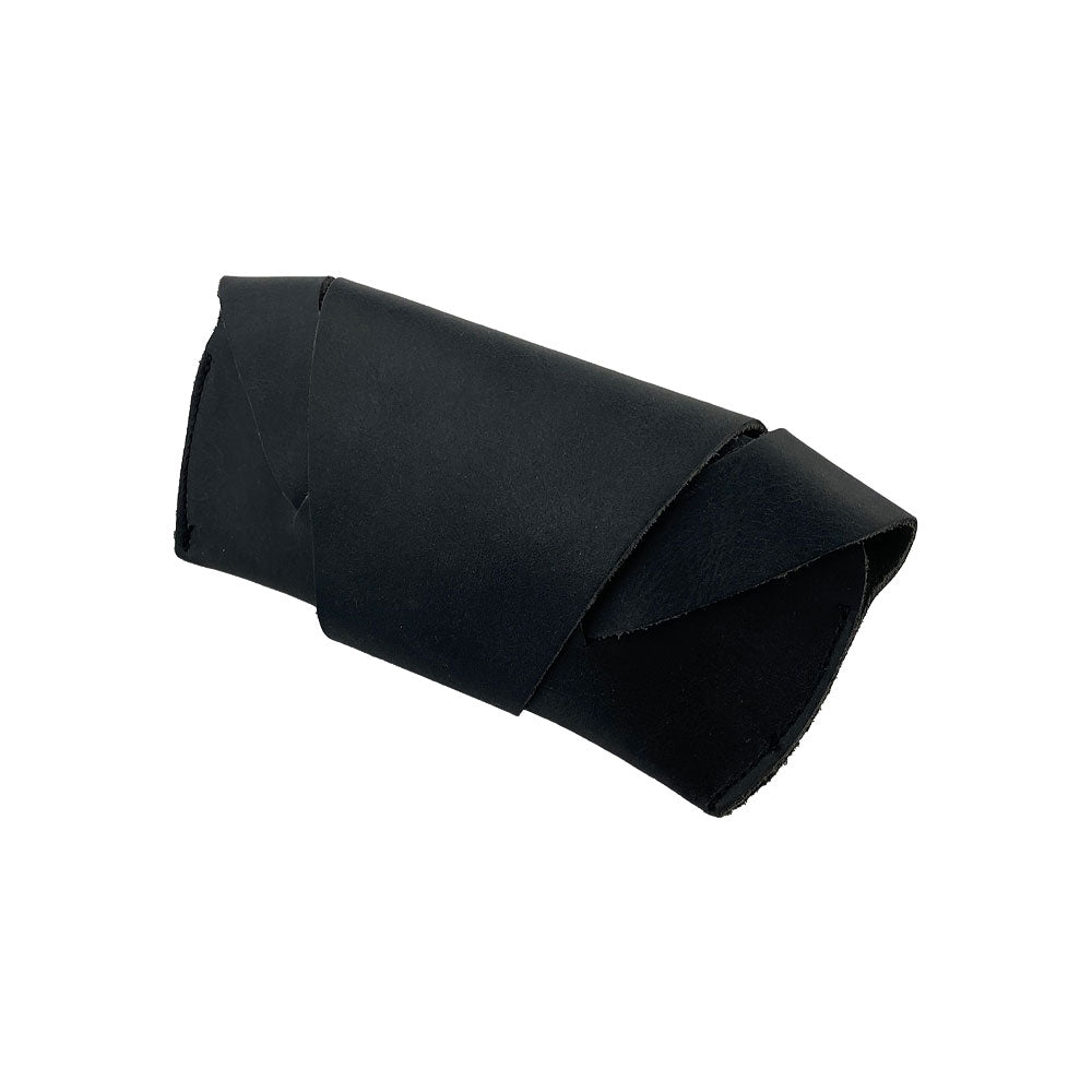 Side view of the black Foldable Sunglass Case by Hide & Drink, showcasing its foldable functionality. Crafted from Full Grain Leather, this case is a proud representation of small batch production and handmade artistry.