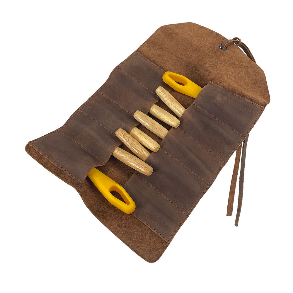 Hide & Drink Tool Roll presents a functional small tool roll-up bag with 10 slots, elegantly designed in durable full grain leather. This portable carry-on pouch makes an excellent woodworking tools organizer for your workshop storage. Each item is hand cut, hand sewn, and crafted with care in La Antigua Guatemala & Oaxaca Mexico, showcasing artisan quality.