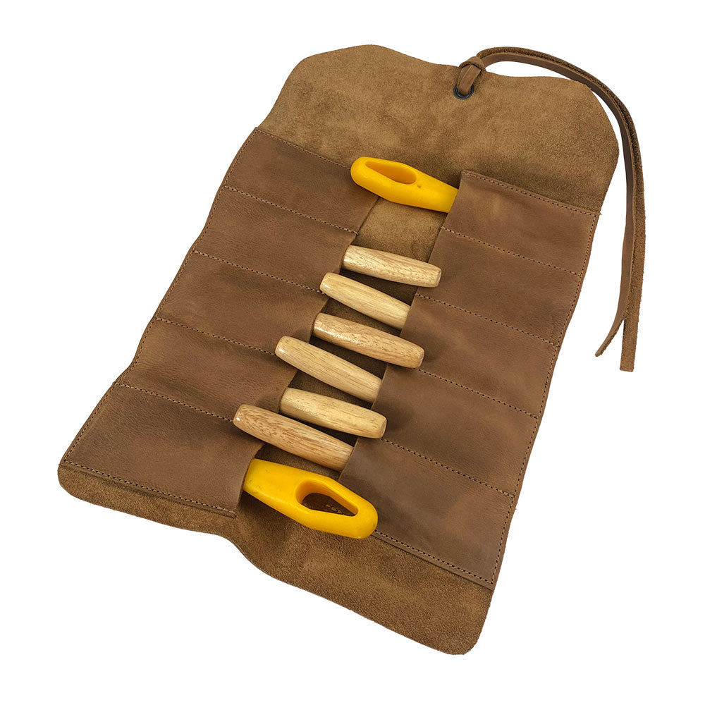 Hide & Drink Tool Roll presents a compact small tool roll-up bag with 10 slots, made from durable full grain leather. Ideal as a portable carry-on pouch for organizing woodworking tools, it enhances any workshop storage solution. Handcrafted with care in La Antigua Guatemala & Oaxaca Mexico, emphasizing artisan skill.