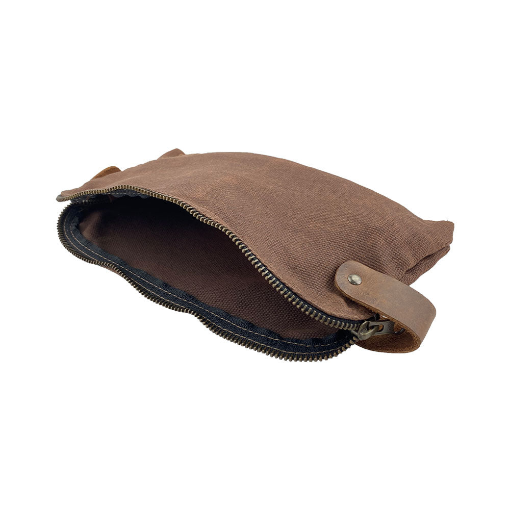 Dopp Kit Utility Bag by Hide & Drink illustrating a refined design perfect for daily essentials. This artisan-crafted large rustic all-purpose Dopp Kit Utility Bag is made from full grain leather emphasizing artisan craftsmanship, ensuring hand cut and hand sewn quality, handmade in La Antigua Guatemala & Oaxaca Mexico.
