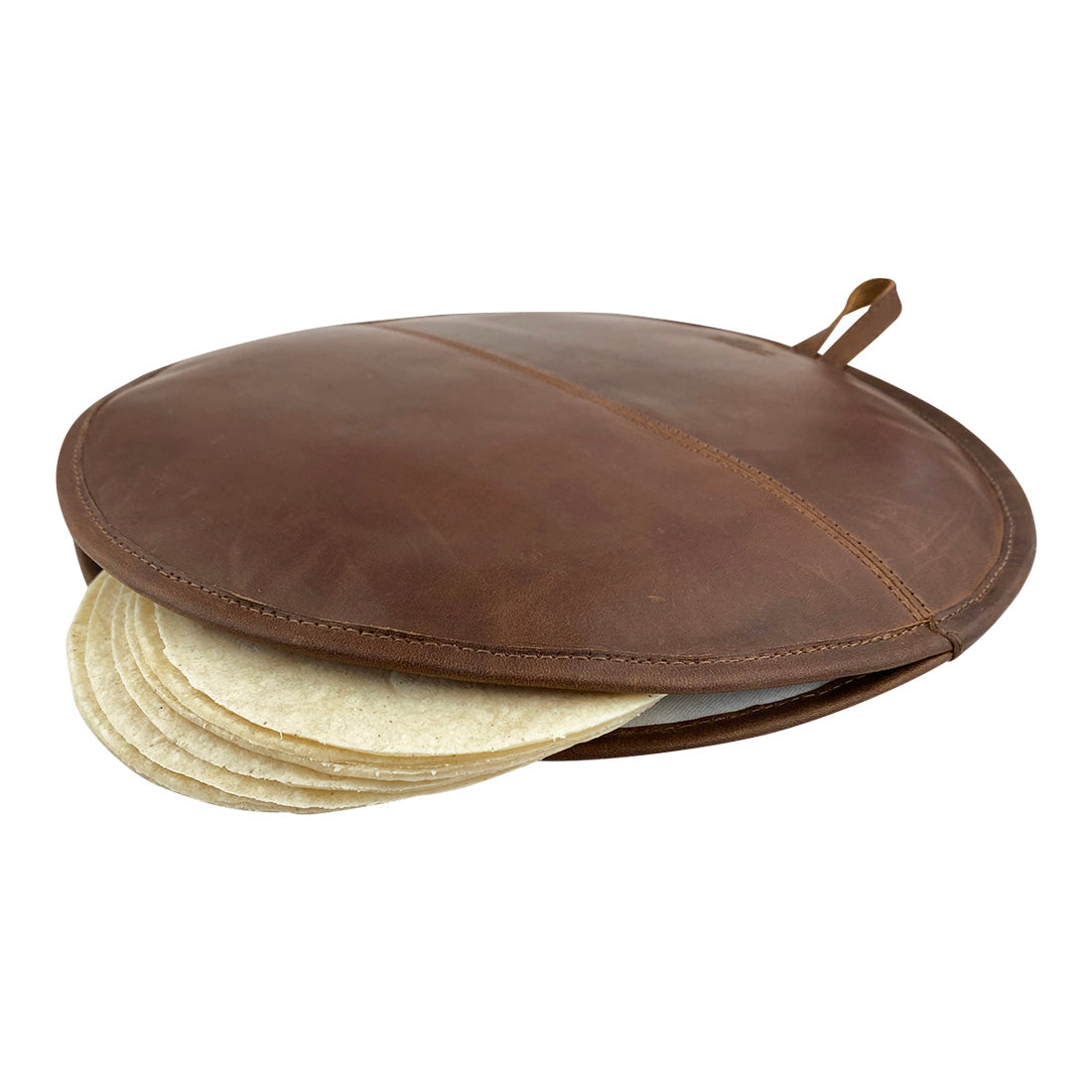A Tortilla Warmer from Cast Leather Co., showcasing warm tortillas inside a beautifully crafted leather pouch. This Tortilla Warmer Pouch serves as a Fabric Tortilla Heater Pouch, made from high-quality full grain leather, reflecting the small batch production methods, hand cut and hand sewn, fire branded by artisans in La Antigua Guatemala & Oaxaca Mexico.