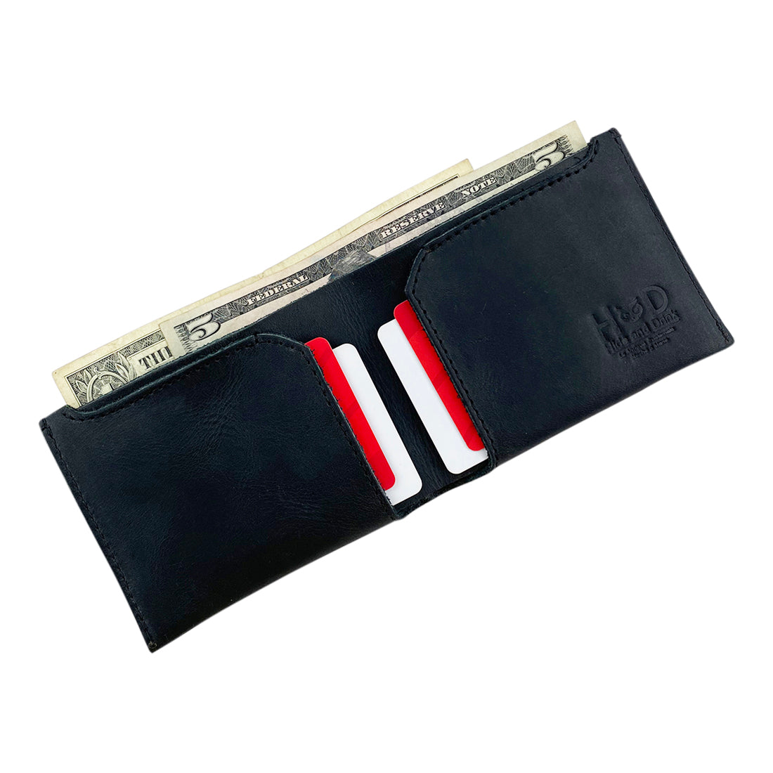 Hide & Drink Classic Wallet filled with cards and cash, showcasing its dual function as a stylish card organizer and money holder. Classic Wallet, Card Organizer, Money Holder, Vintage Pocket, Travel Accessories, Full Grain Leather, StockyardX, Small Batch Production, Hand Cut, Hand Sewn, Fire Branded, Artisan, Handmade in La Antigua Guatemala & Oaxaca Mexico.