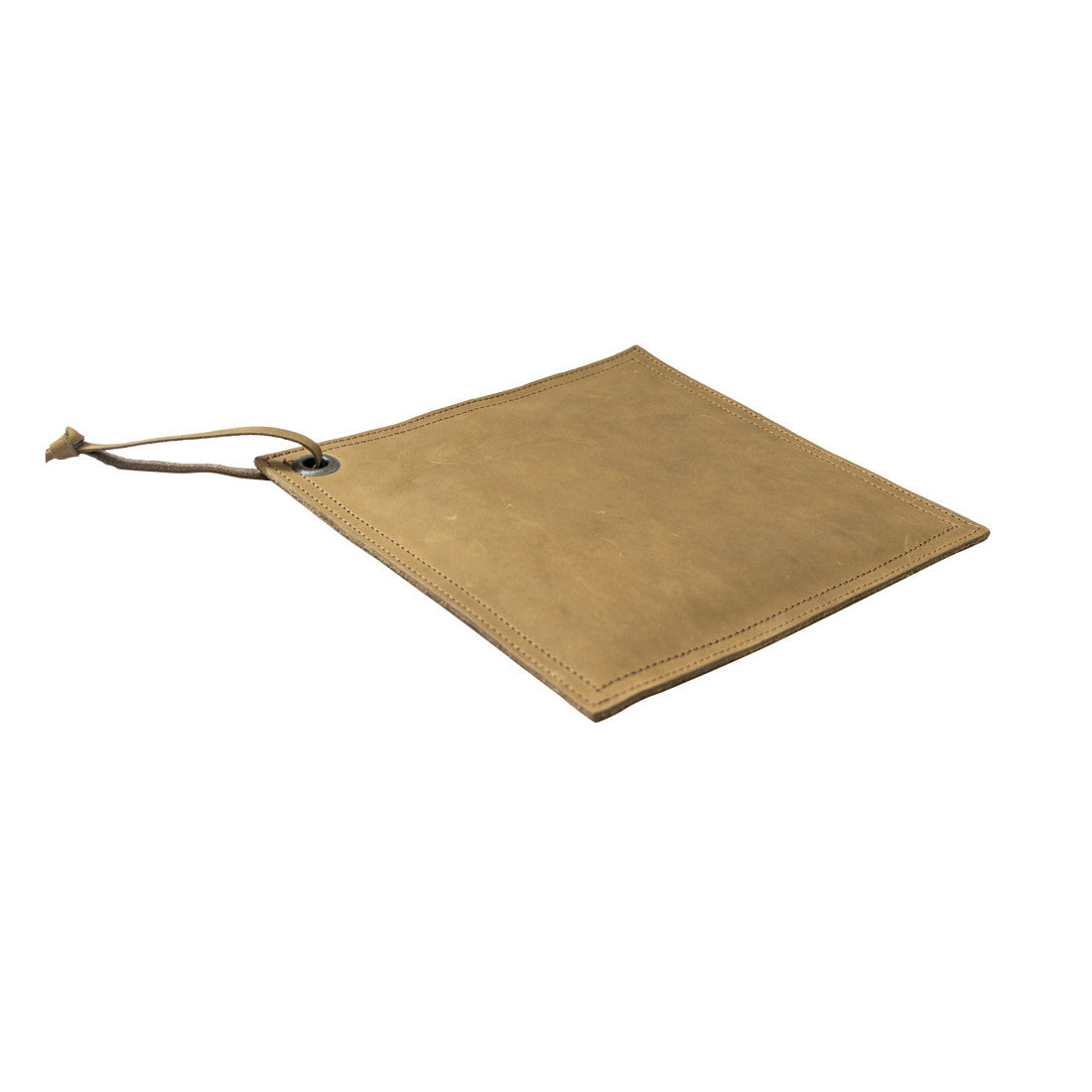 Hide & Drink Pot Pad displayed with a cast iron skillet, emphasizing its use as a hot pot pad. Crafted from artisan leather, it's both stylish and functional.